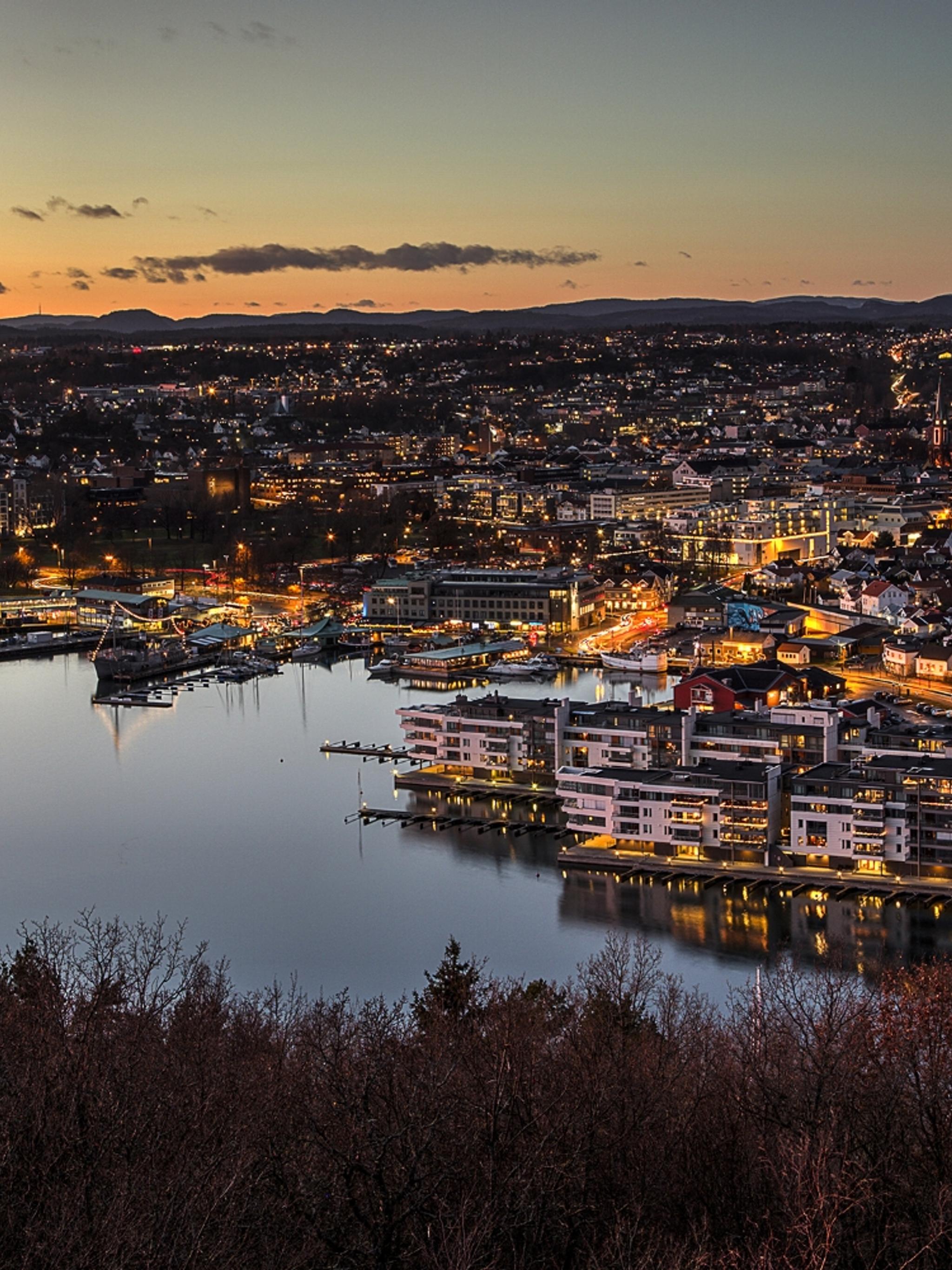 Sandefjord, and the surrounding fjord, seen from a distance at night time
