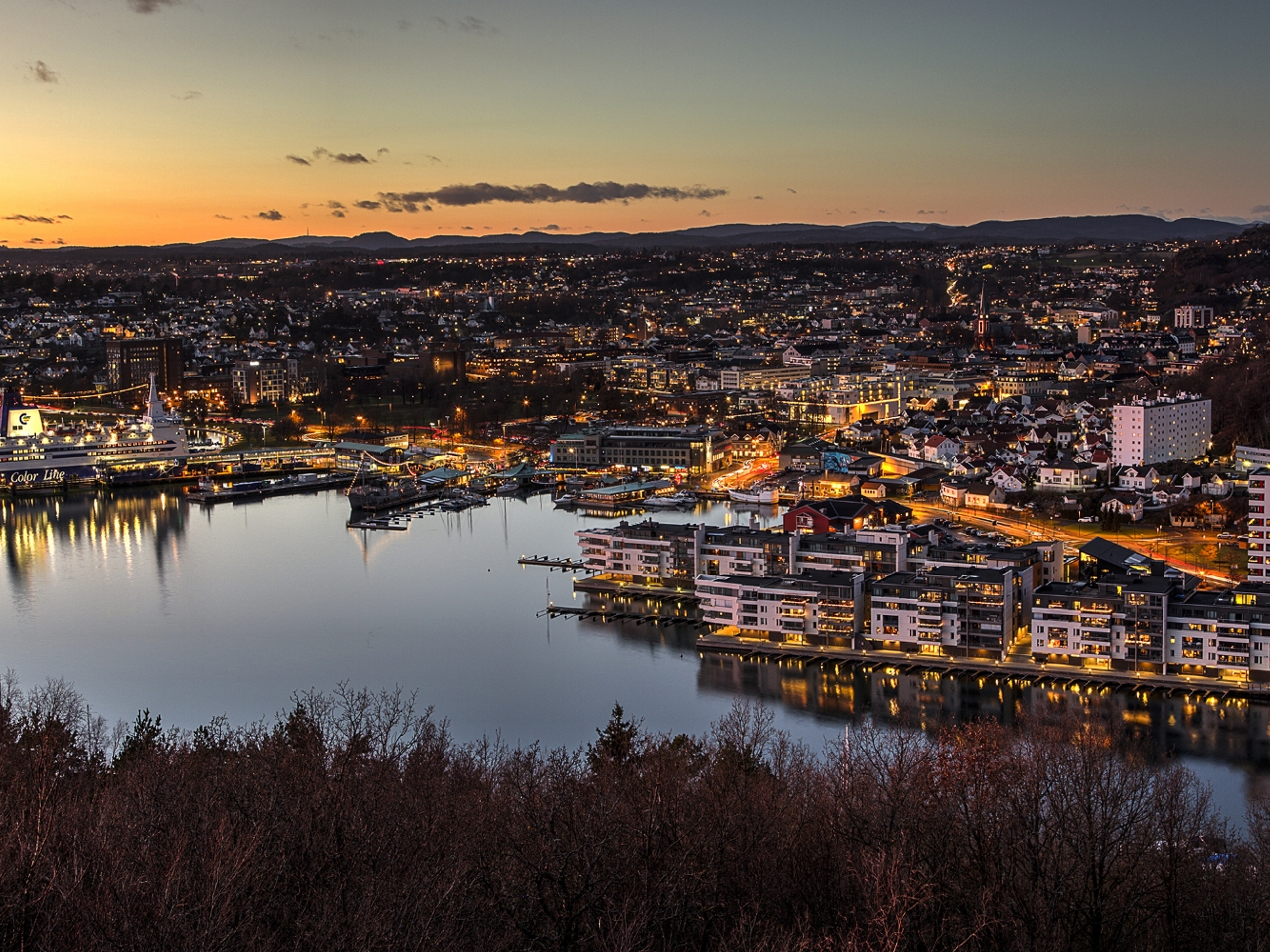 Sandefjord, and the surrounding fjord, seen from a distance at night time