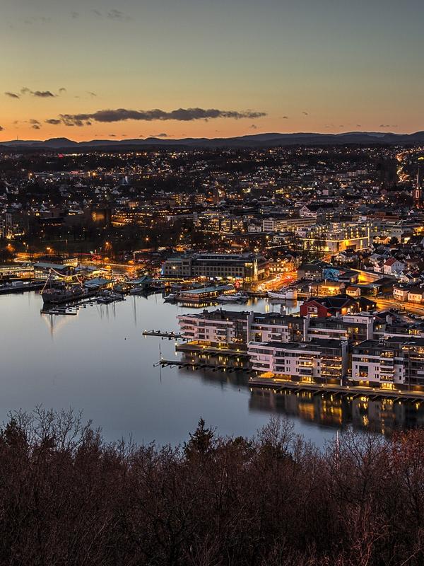 Sandefjord, and the surrounding fjord, seen from a distance at night time