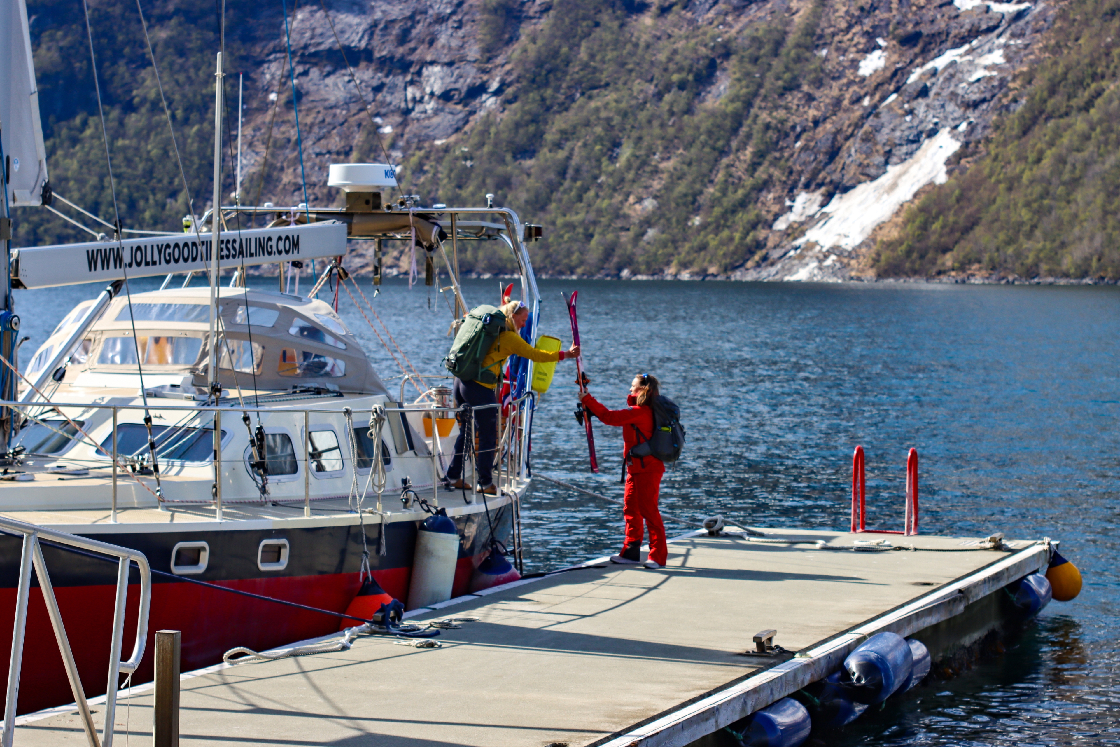 Two people going ski touring at Sunnmøre, Fjord Norway.