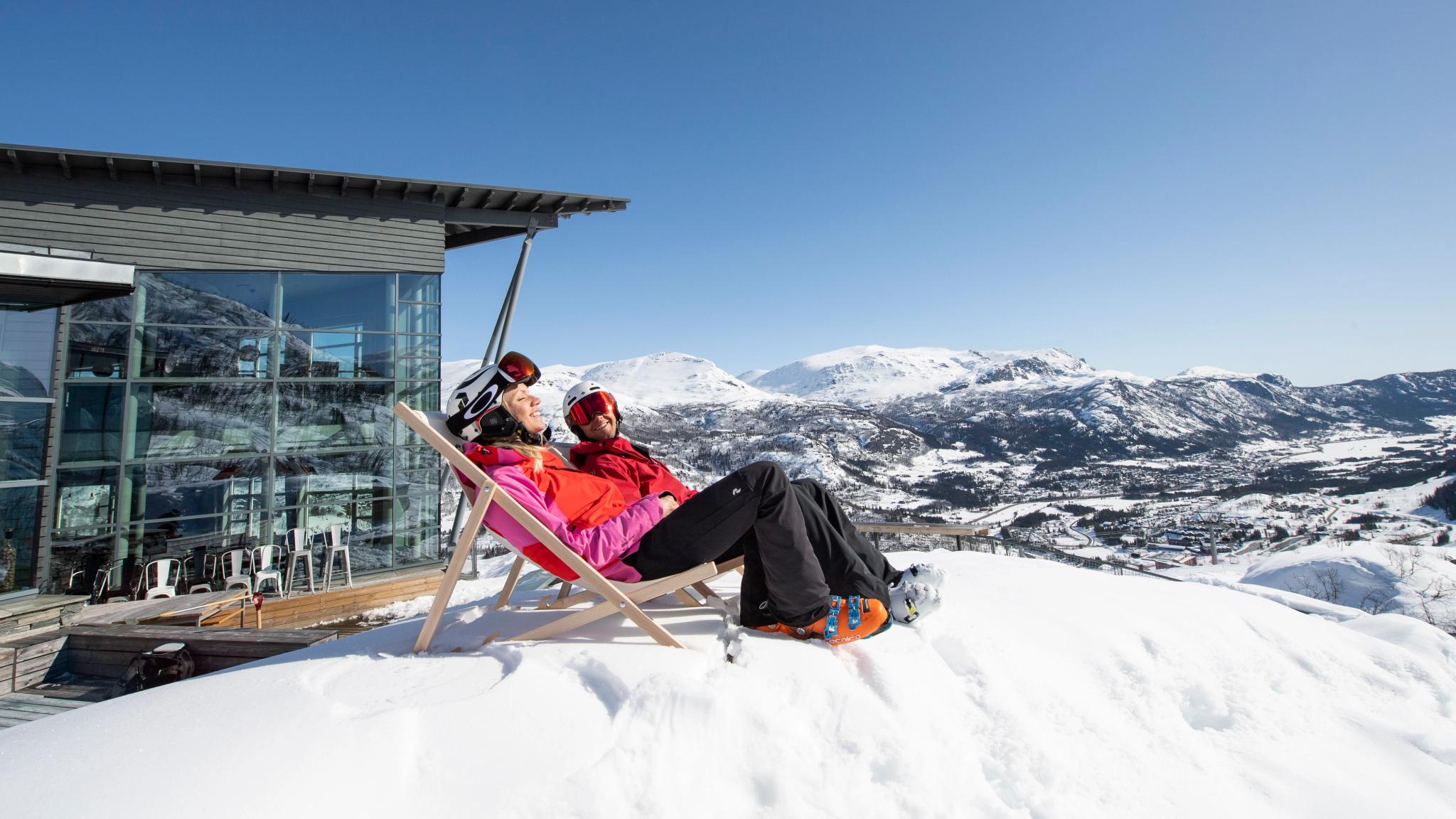 Two people taking a break from skiing in Hemsedal, Eastern Norway