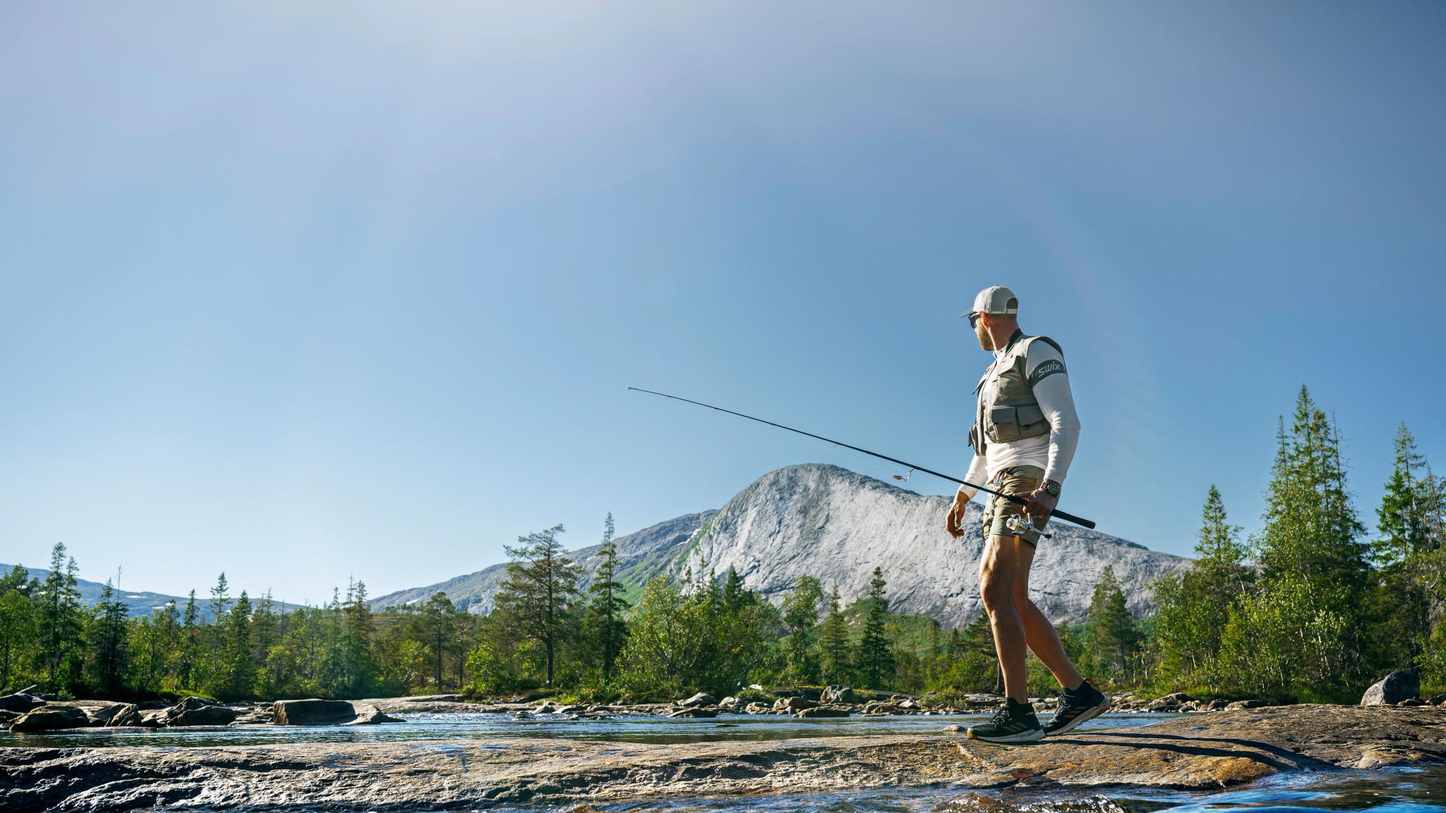 A man fishing in a river