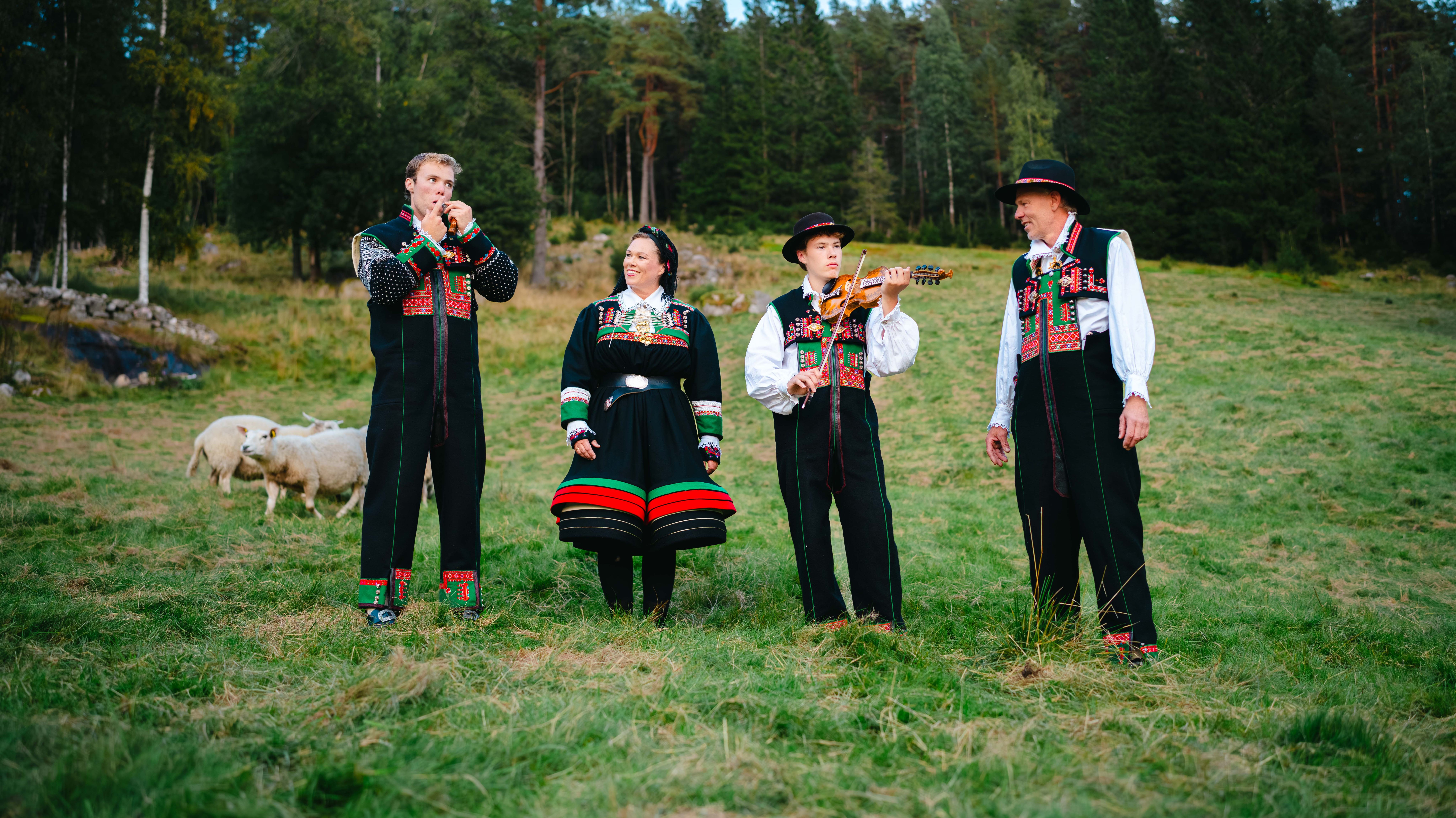 The Stulien Robstad family at the farm Syrtveit Gard, in the Setesdalen valley, Southern Norway, all dressed up in Setesdalbunad