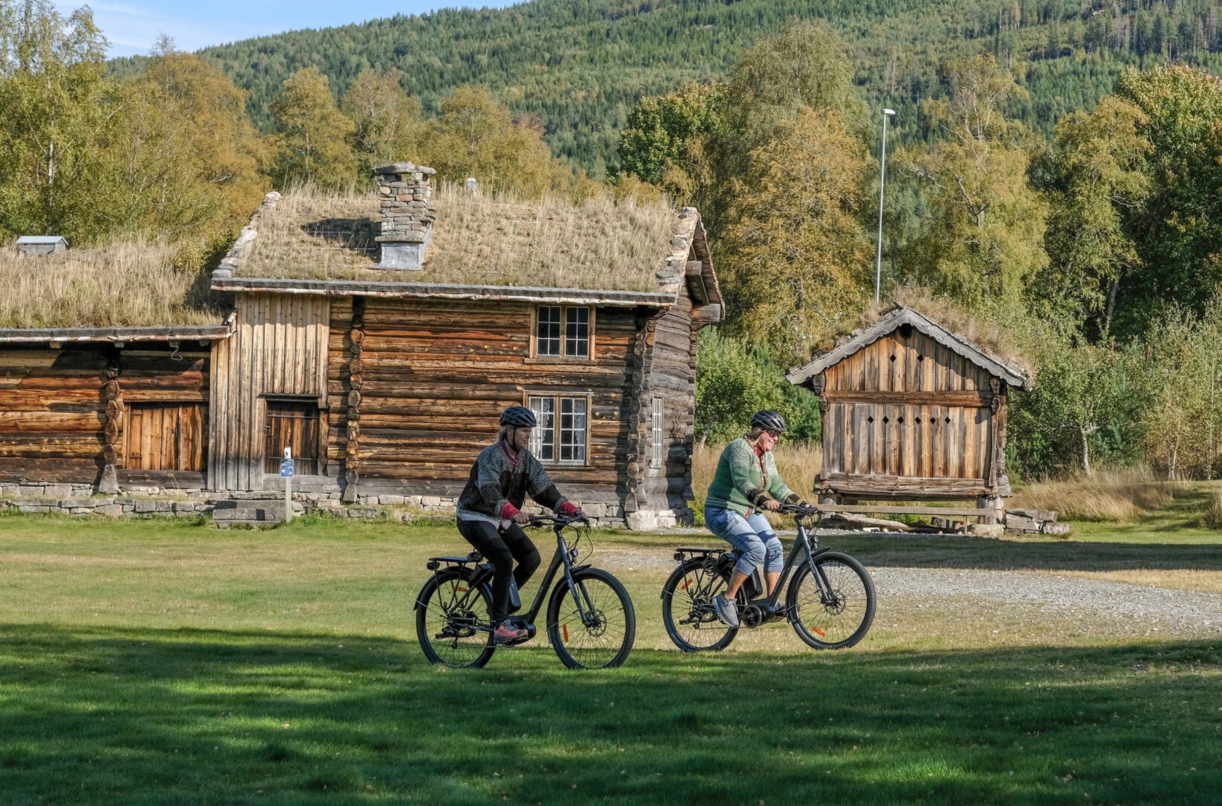 Two woman on electric cycles in Setesdal