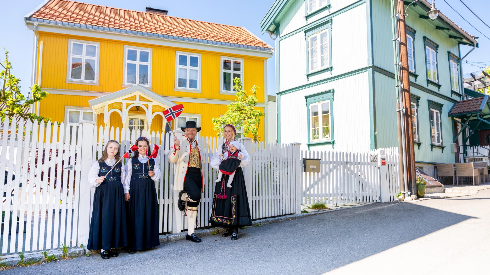 A man and a woman in bunads on 17 of May - Norway’s national day