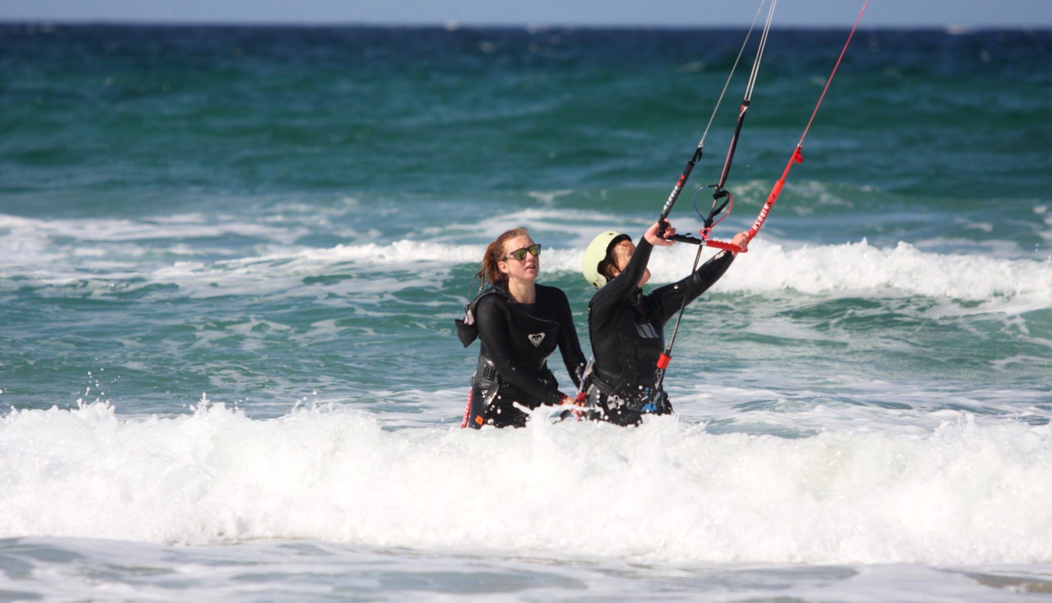 A person gets help to kite at Jæren, Fjord Norway.