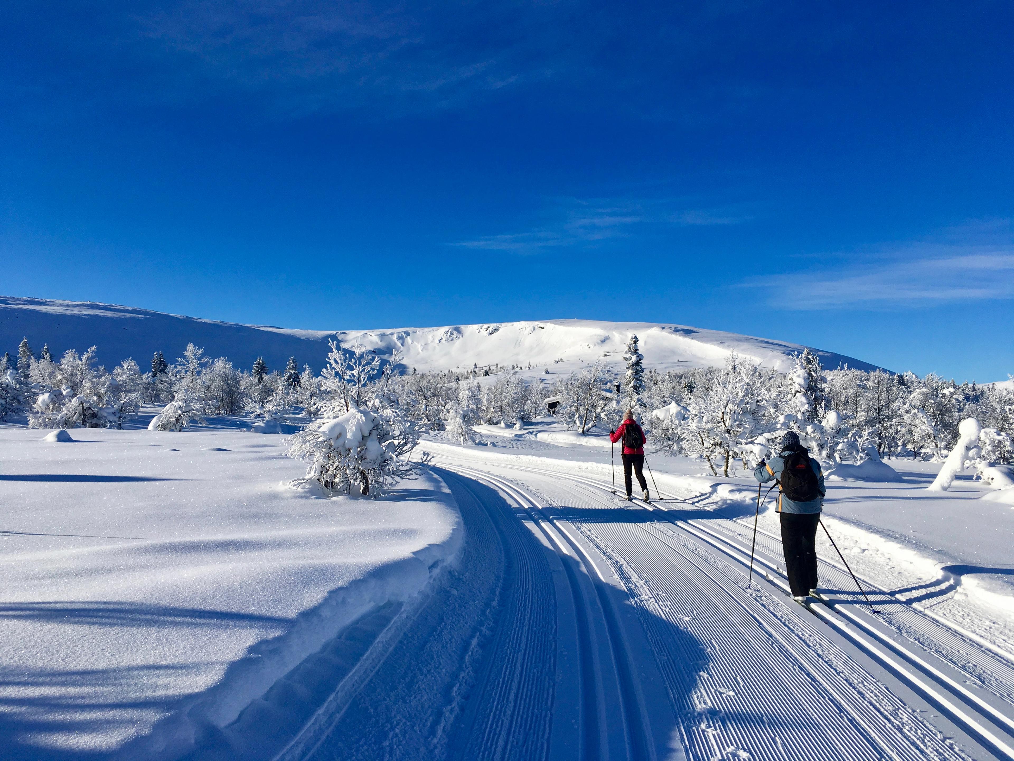 People skiing in the mountains in Gudbrandsdalen, Eastern Norway