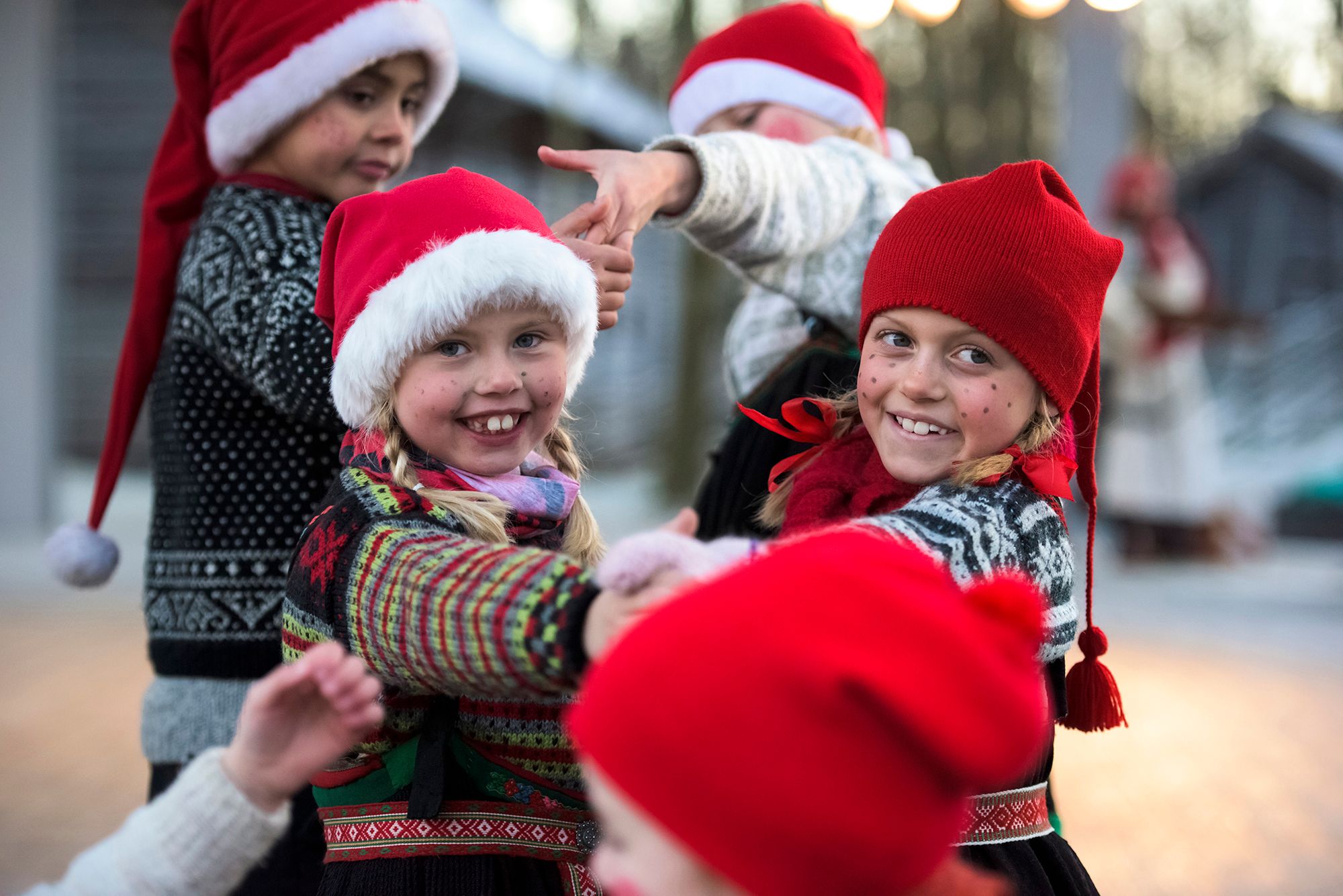 Children with Christmas hats at the Norsk Folkemuseum, Oslo, Eastern Norway