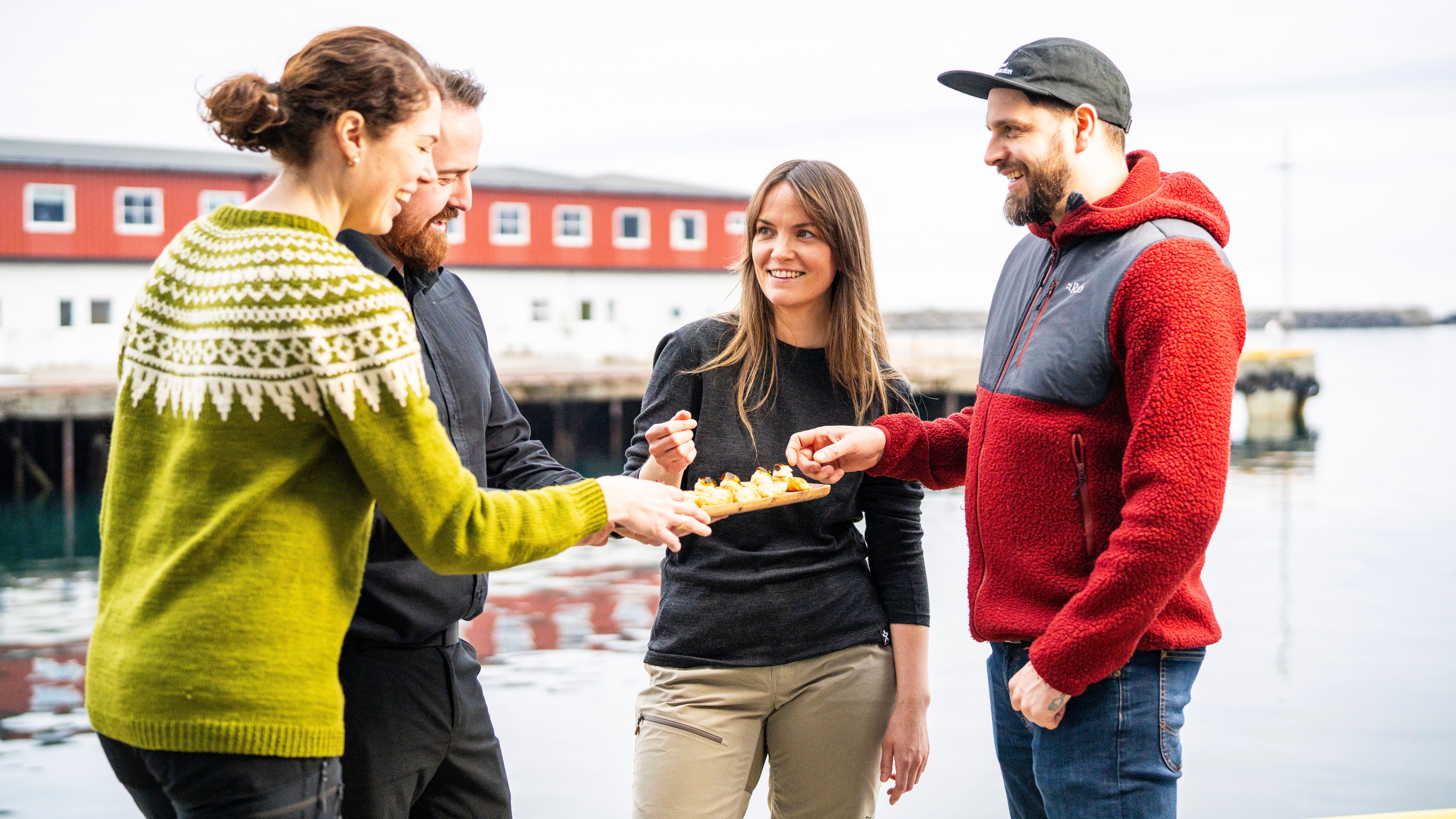 Tourists sharing a meal at the quay.