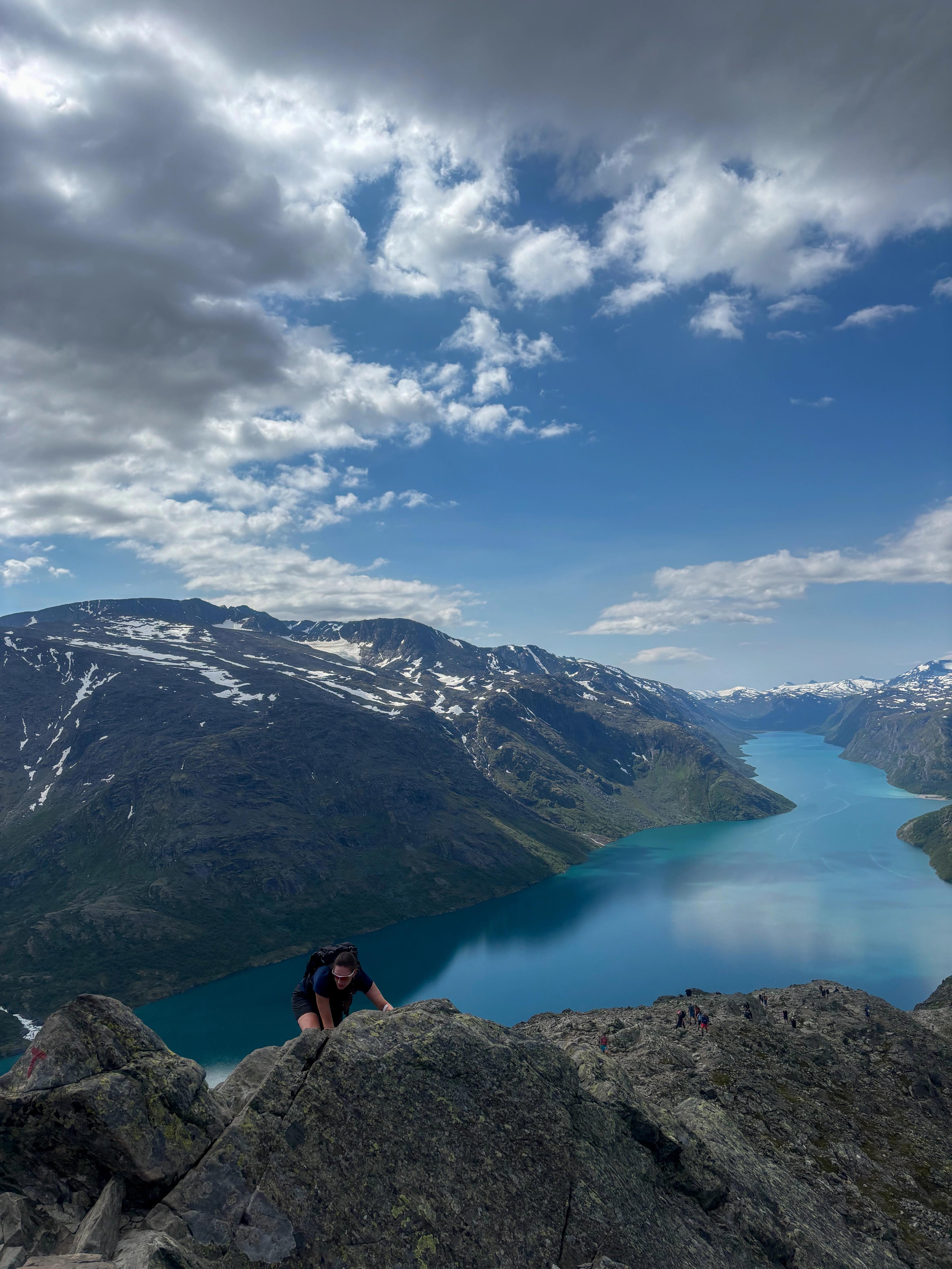 A woman hiking the Besseggen ridge in the Jotunheimen mountains.