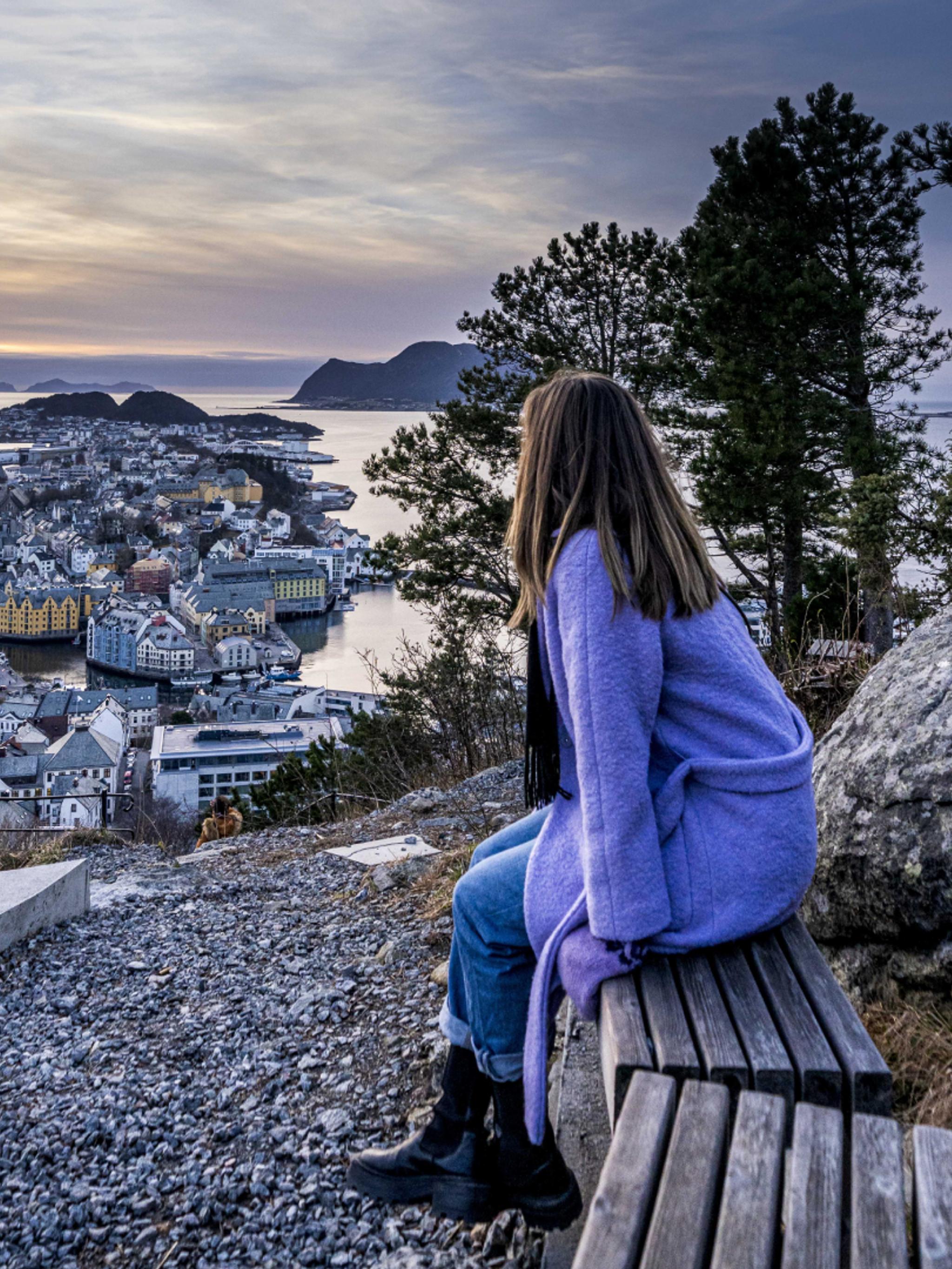 Girl enjoying the view of Ålesund from the Aksla viewpoint
