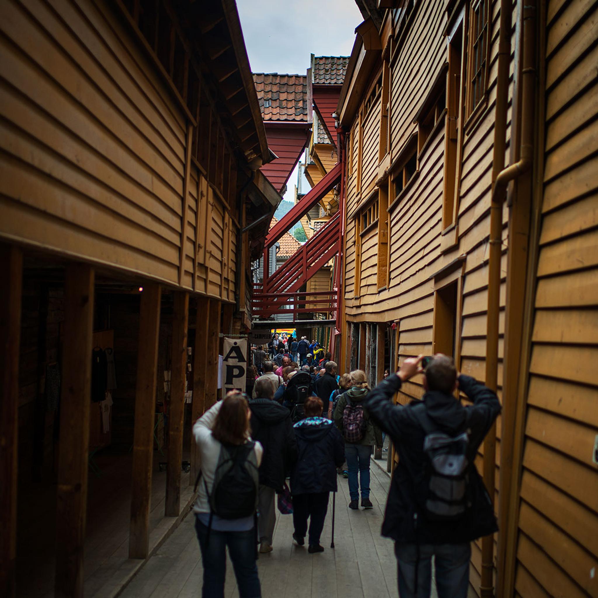 People photographing at Bryggen in Bergen, Fjord Norway
