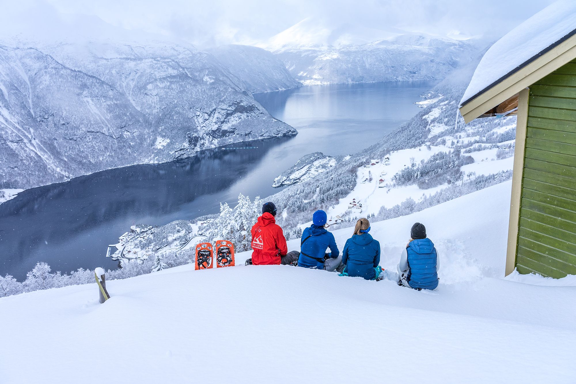 People taking a break from snowshoeing in Møre og Romsdal, Fjord Norway