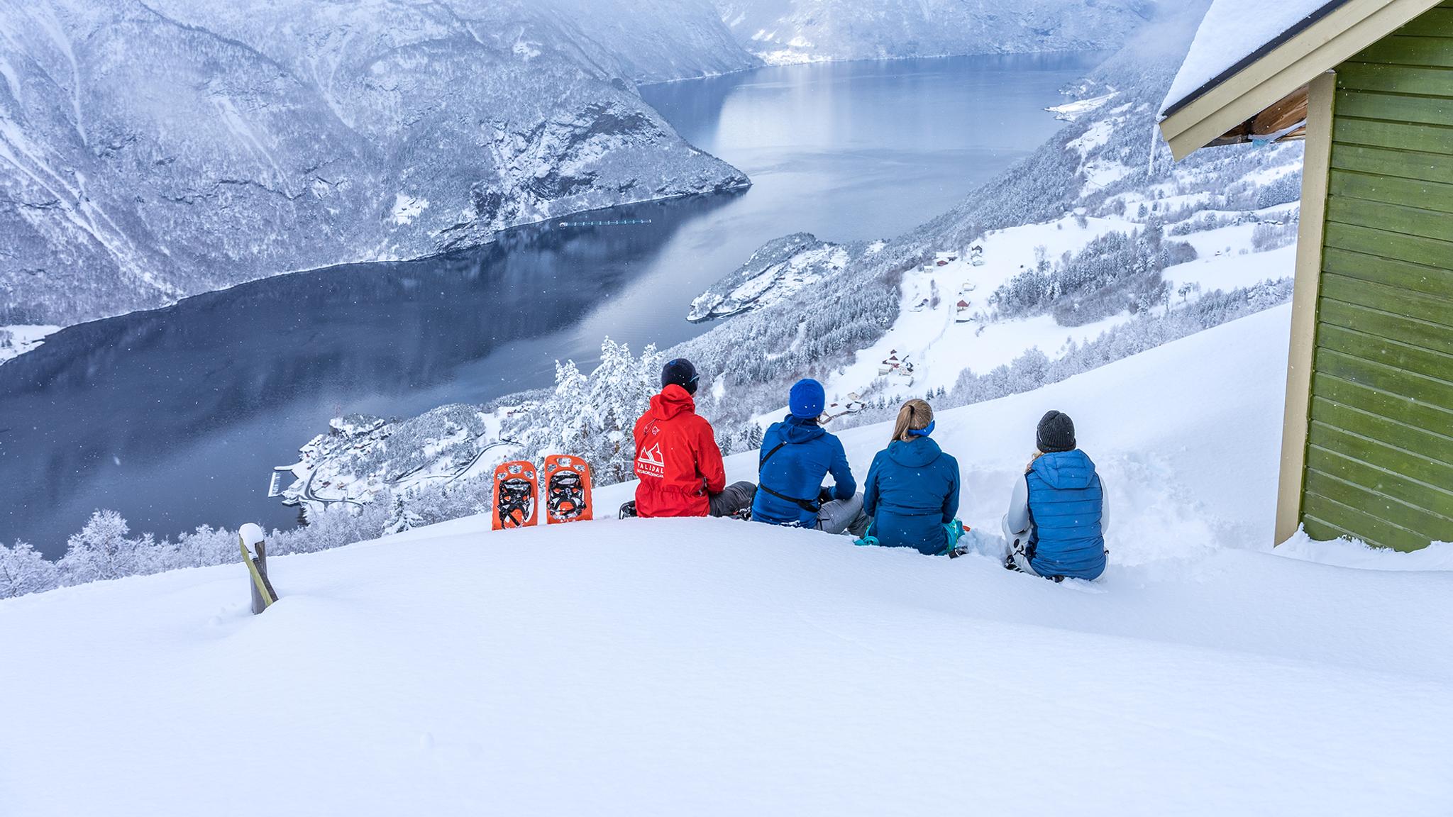 People taking a break from snowshoeing in Møre og Romsdal, Fjord Norway