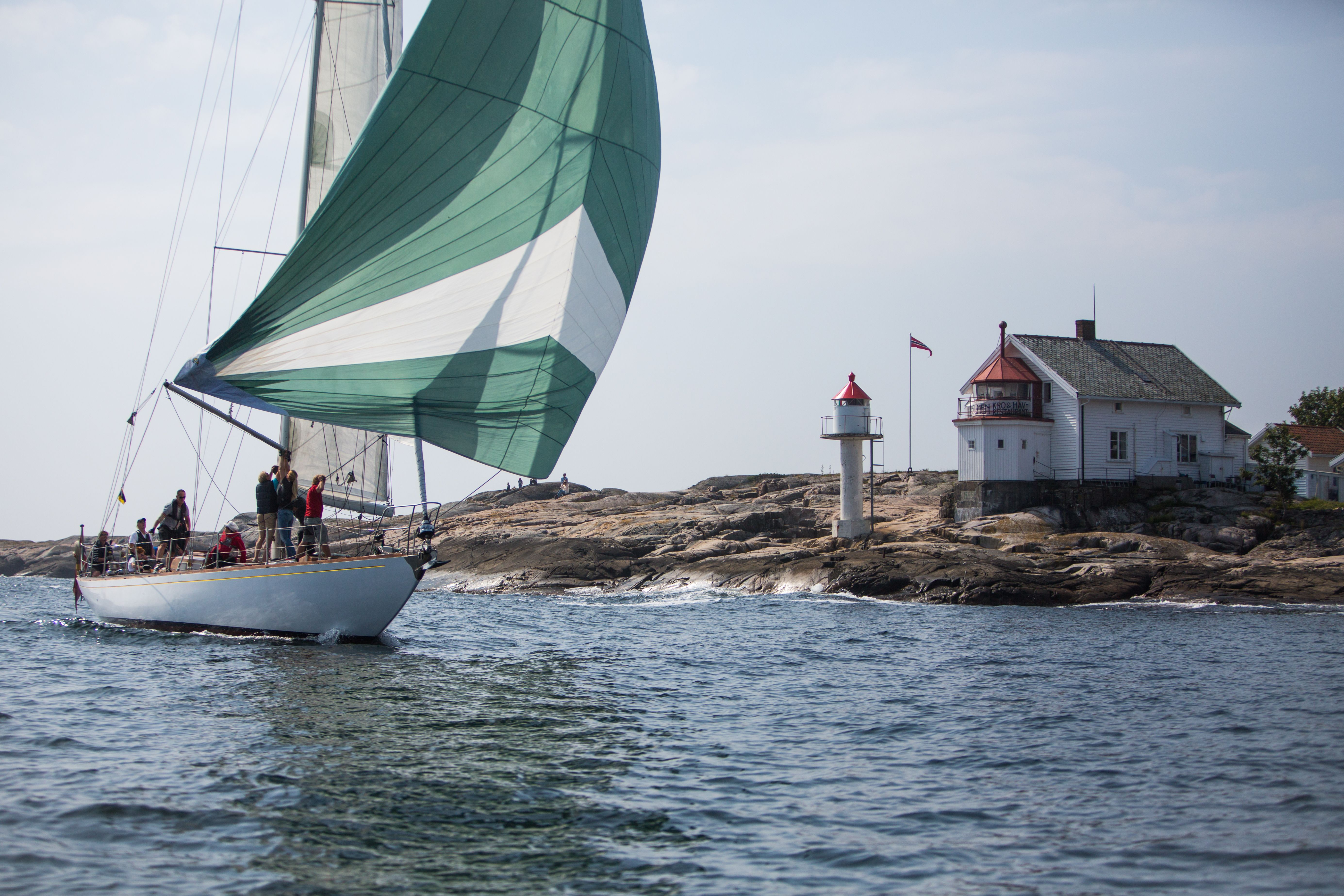 Sailboat at Stangholmen lighthouse in Risør