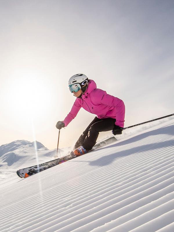 A woman skiing down an alpine slope in Hemsedal in Eastern Norway