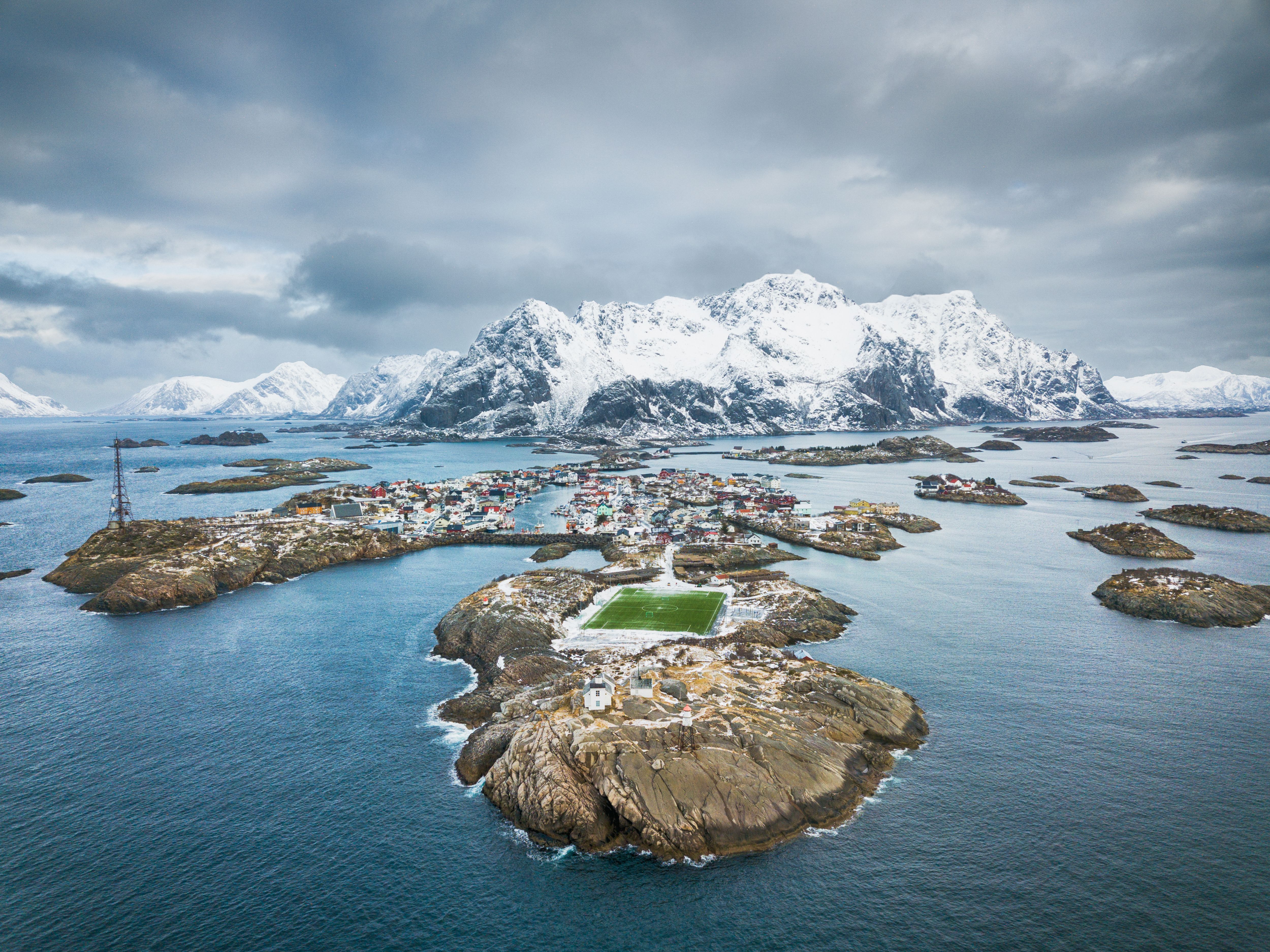 A bird's view of the rugged coastline in Henningsvær in Northern Norway