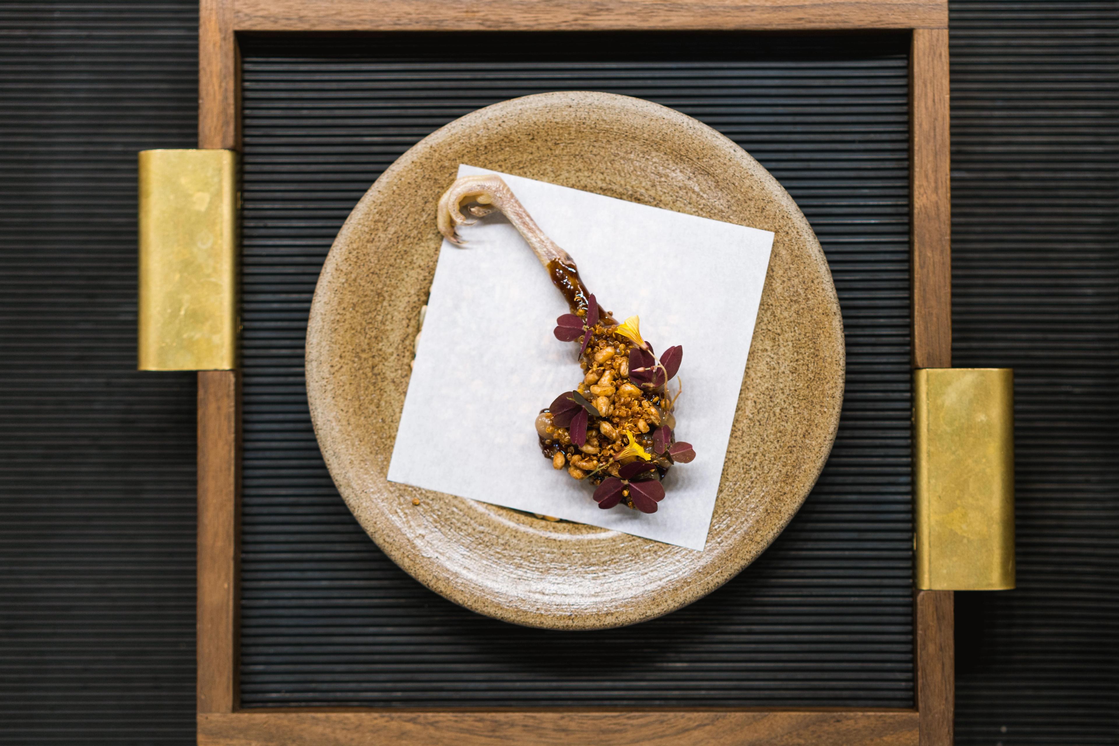 The Michelin-starred restaurant RE-NAA's dish with quail from Ryfylke, Norway.