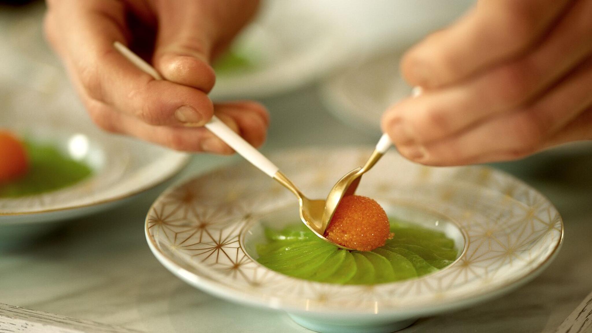 Beautiful decoration of caviar plate