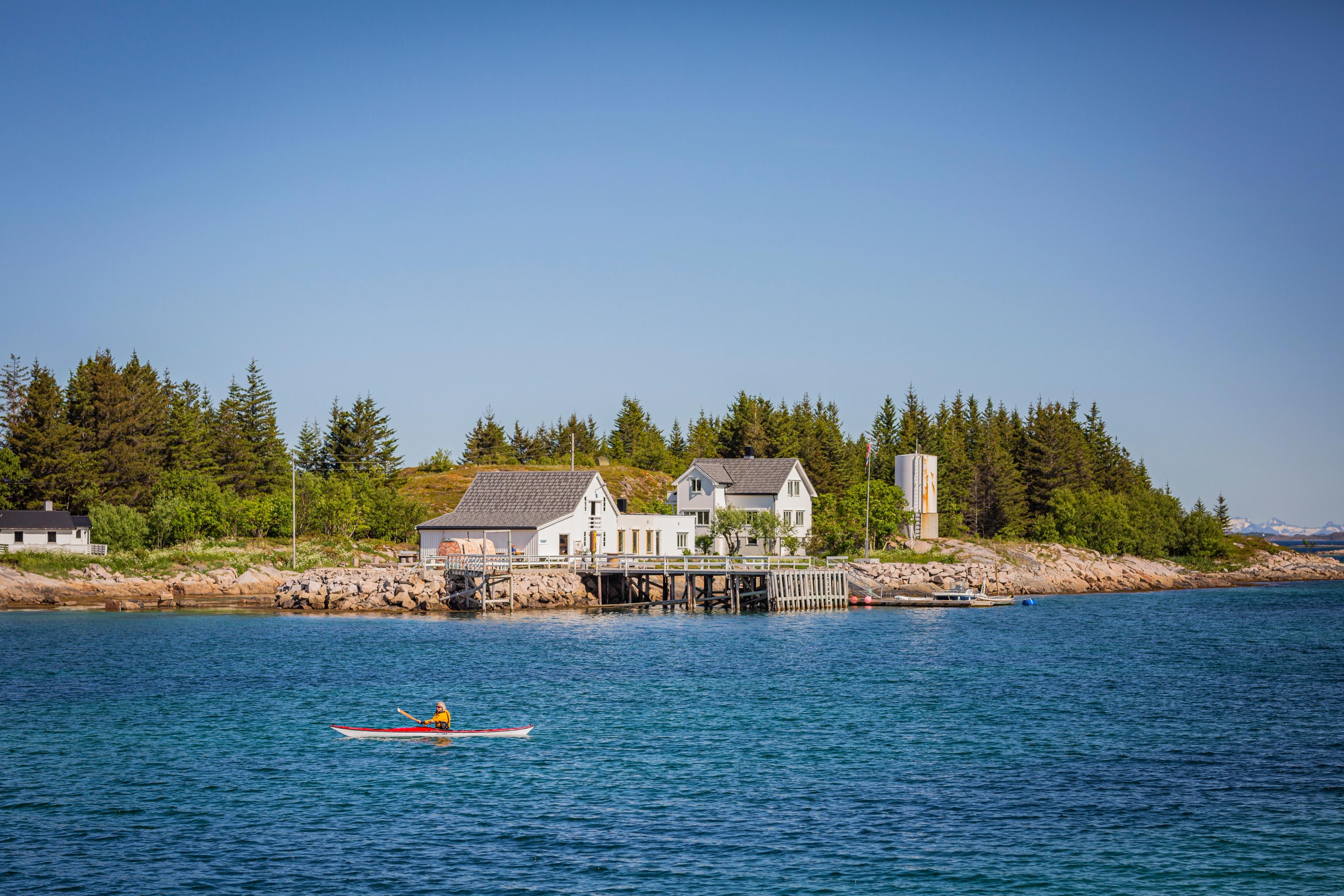 A person in a kayak near Naustholmen in Salten, Northern Norway