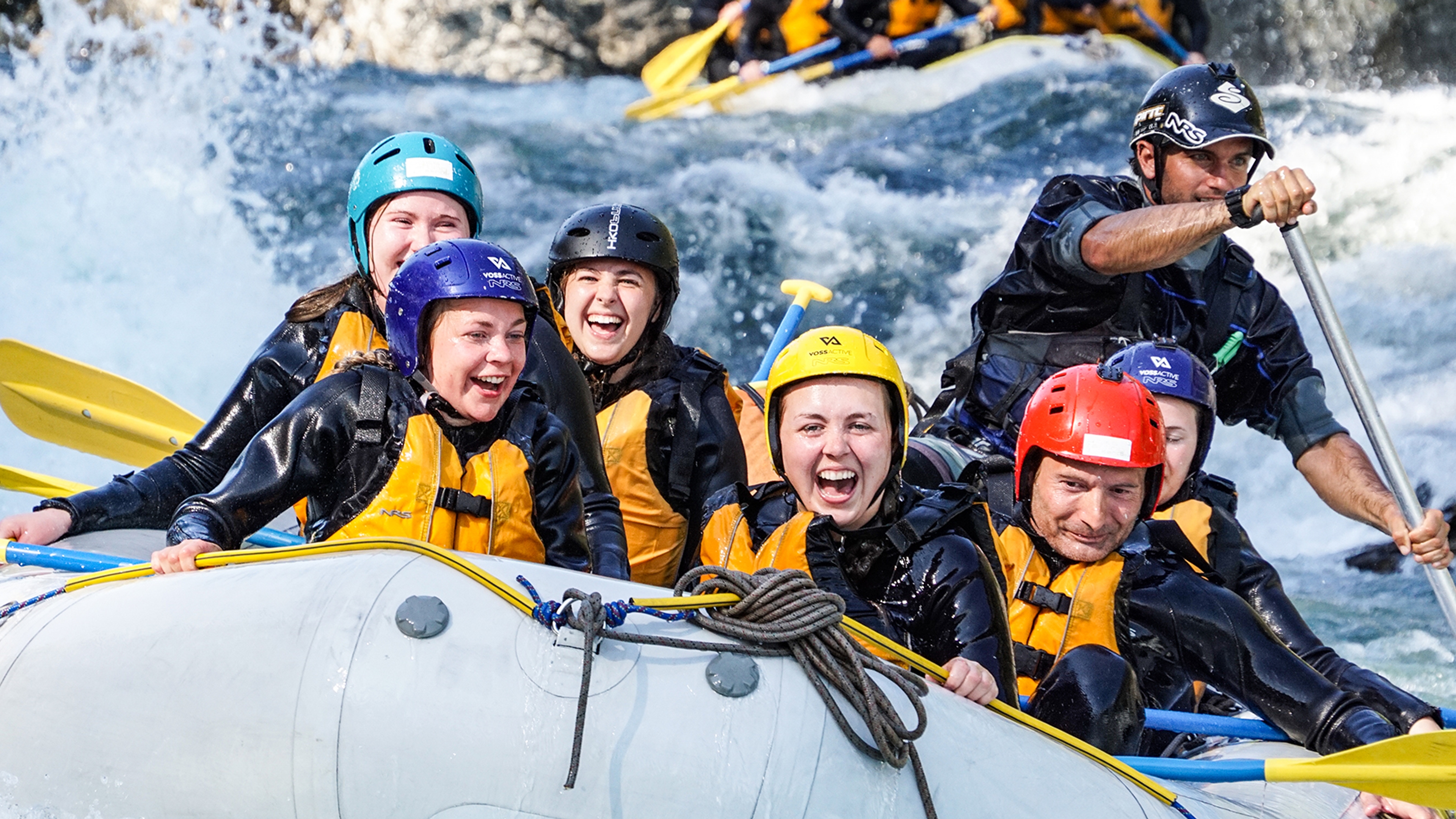 A group of people rafting in Voss, Fjord Norway