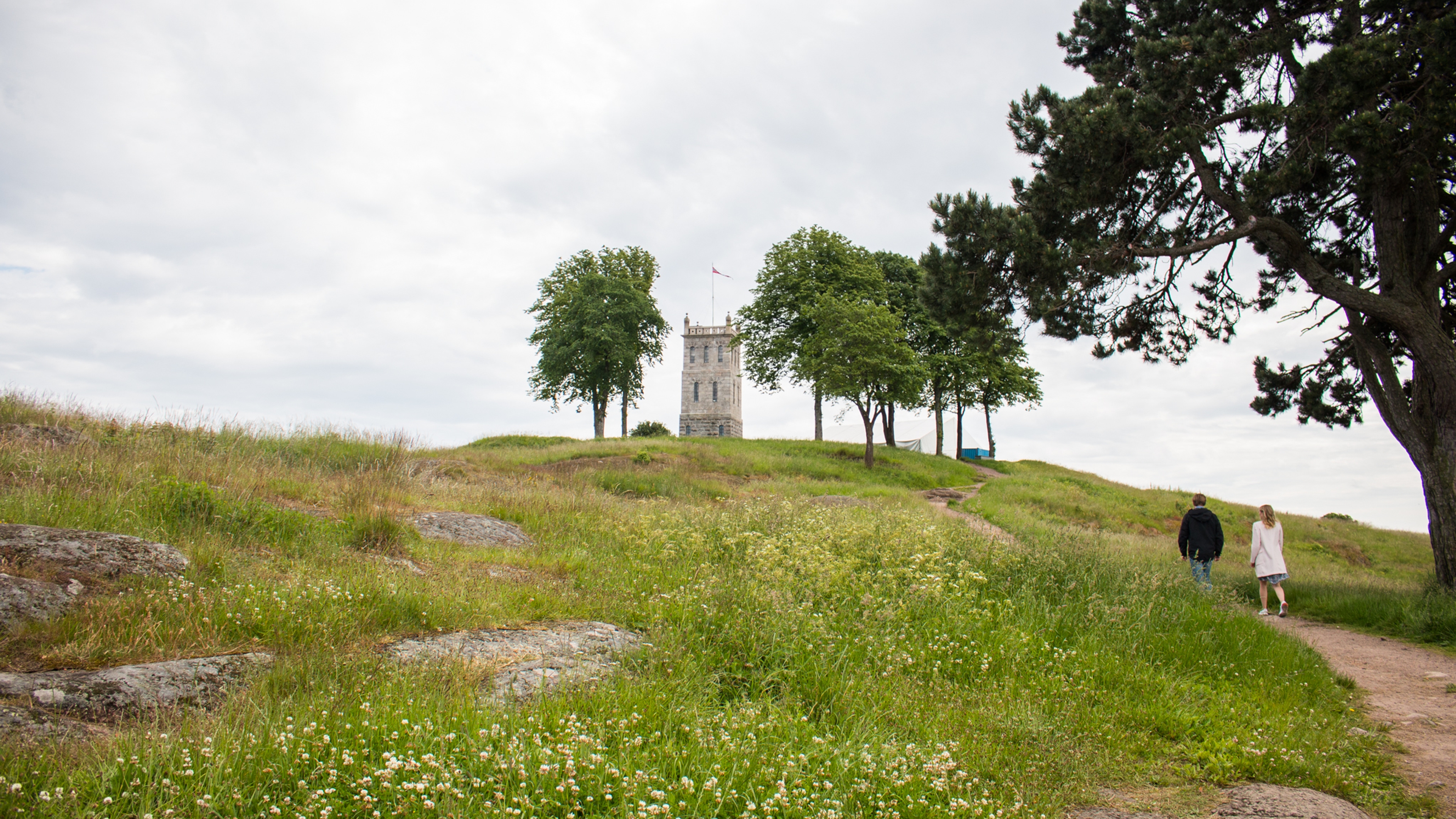 A couple visiting the Slottsfjell tower in Tønsberg, Eastern Norway