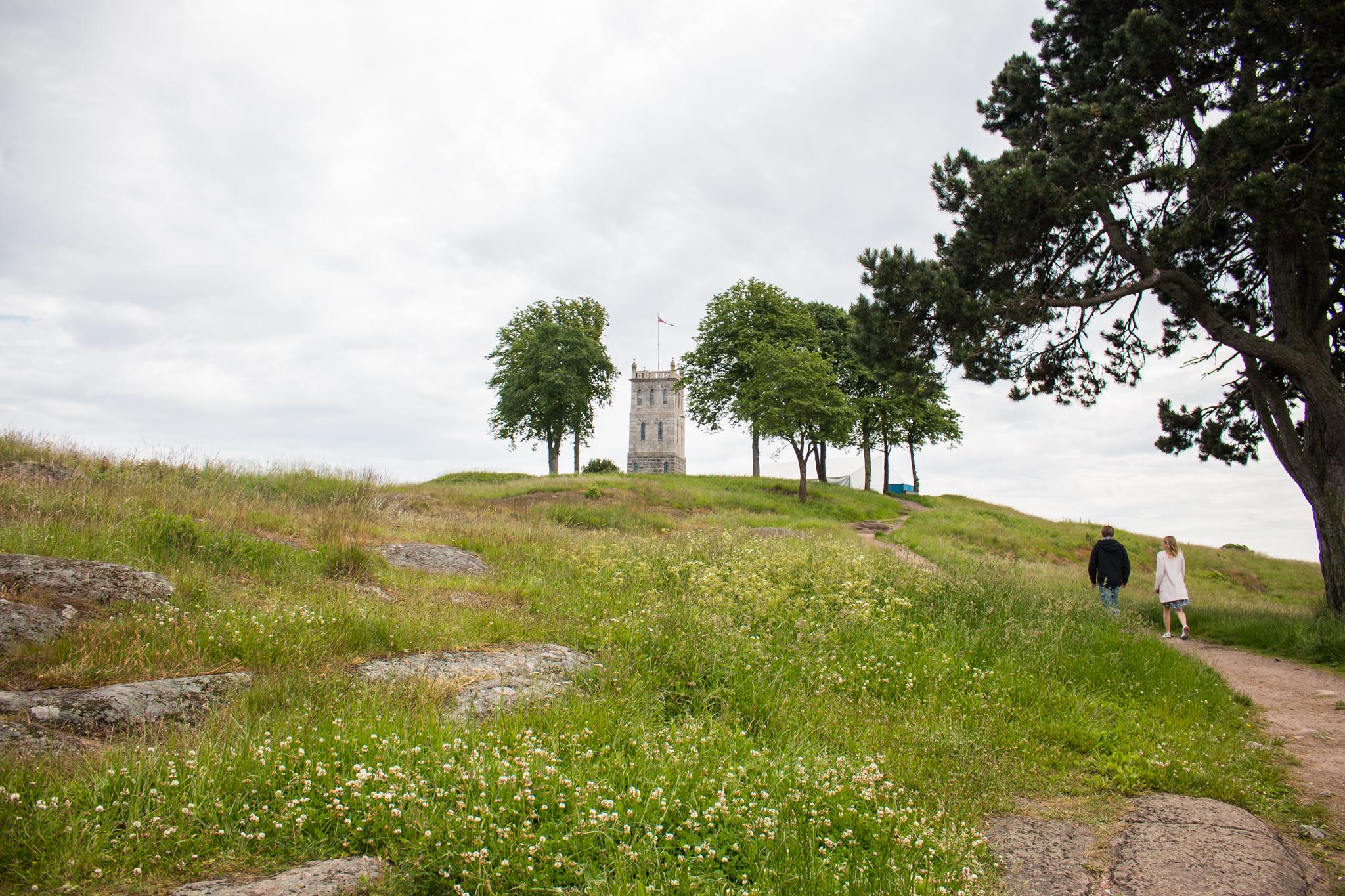A couple visiting the Slottsfjell tower in Tønsberg, Eastern Norway