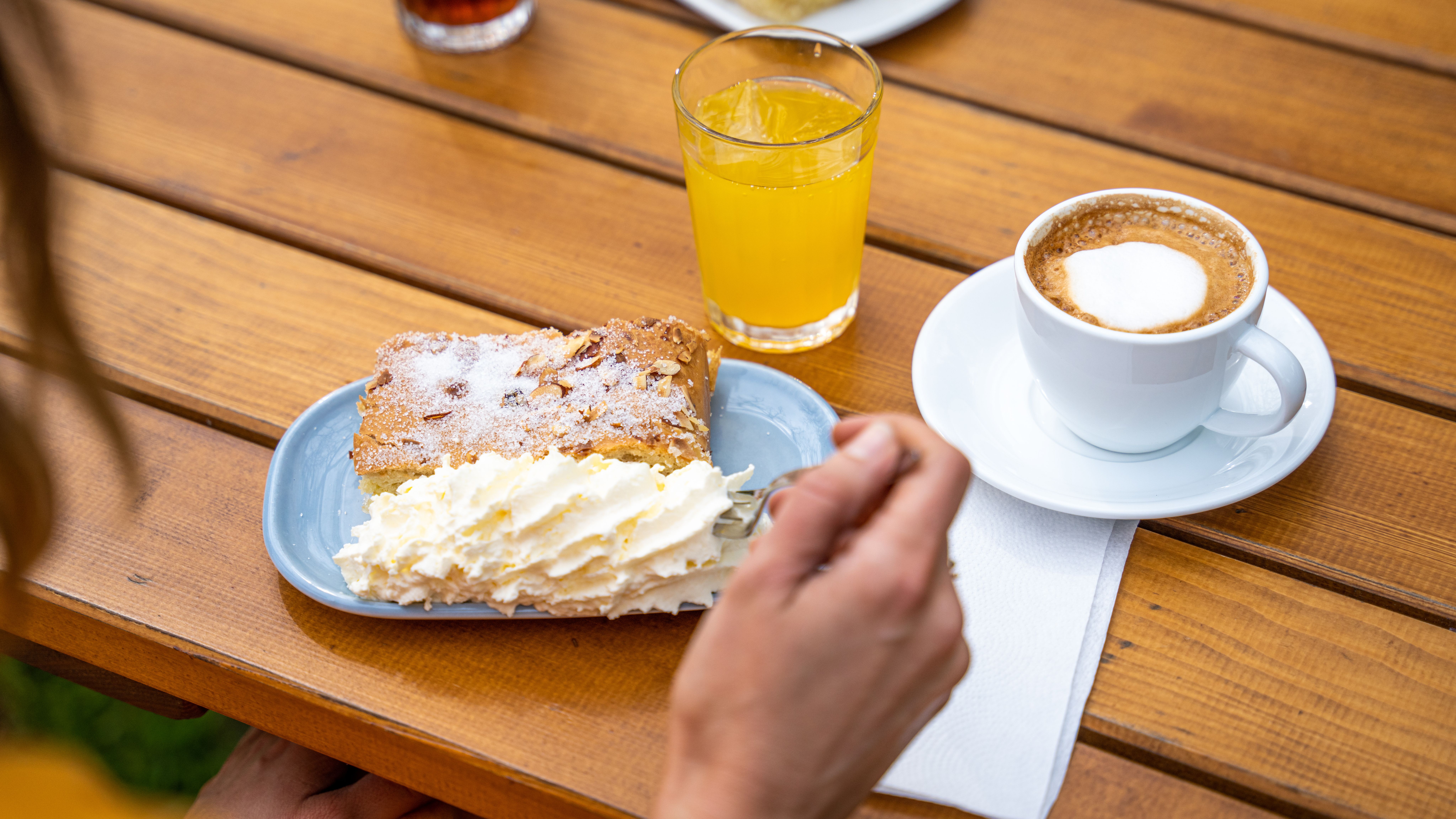 Woman eating Albykringle (the Alby cake) at Gallery F15, at Jeløy in Moss