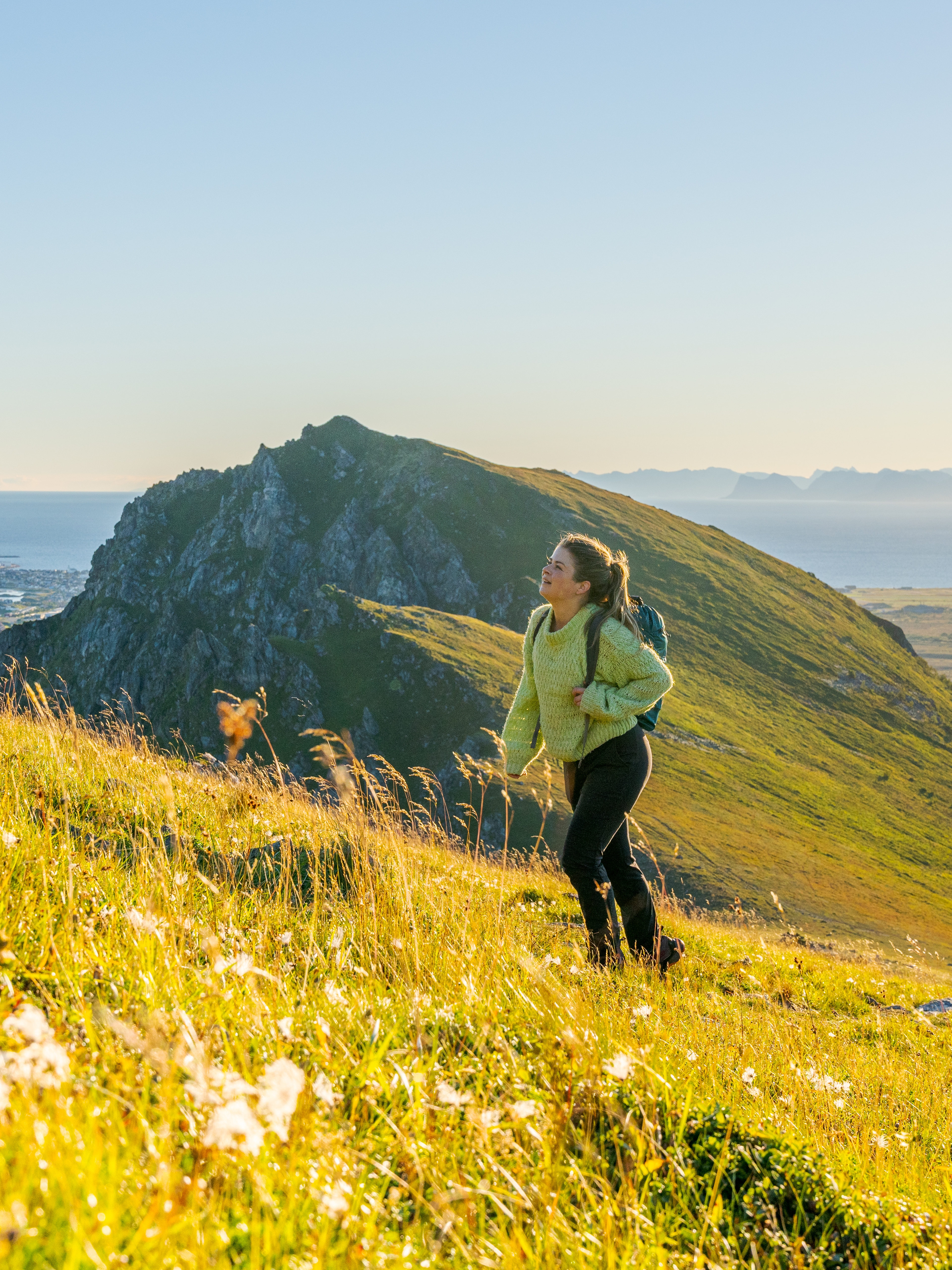 Woman hiking in the sun in Vesterålen, Northern Norway