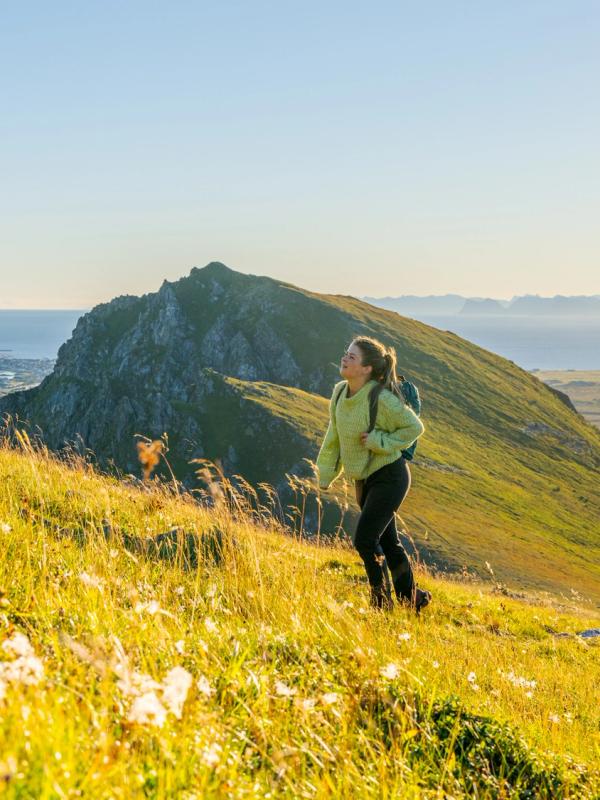 Woman hiking in the sun in Vesterålen, Northern Norway