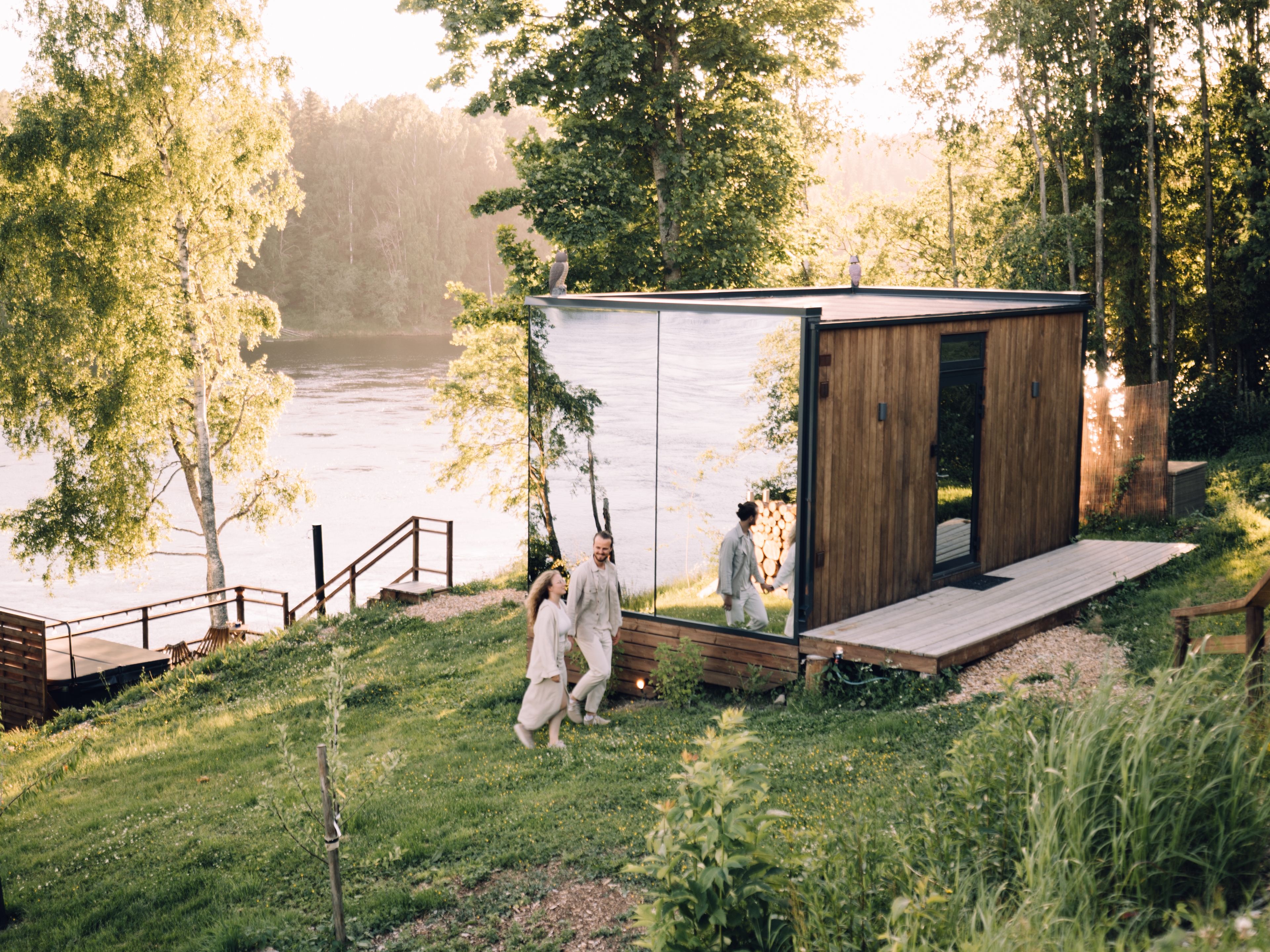 A couple staying at WonderInn Riverside by Huser Farm in Fenstad