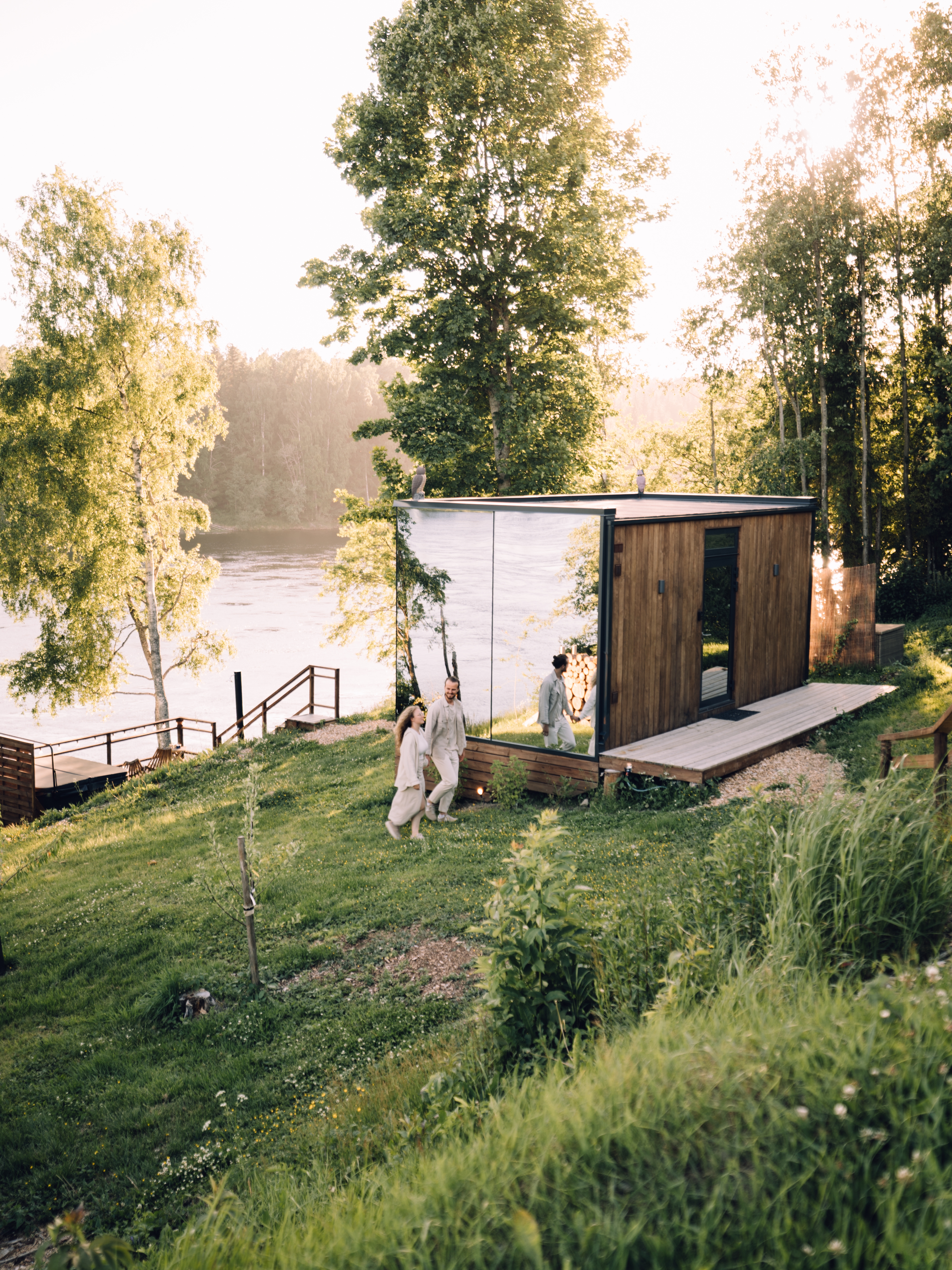 A couple staying at WonderInn Riverside by Huser Farm in Fenstad
