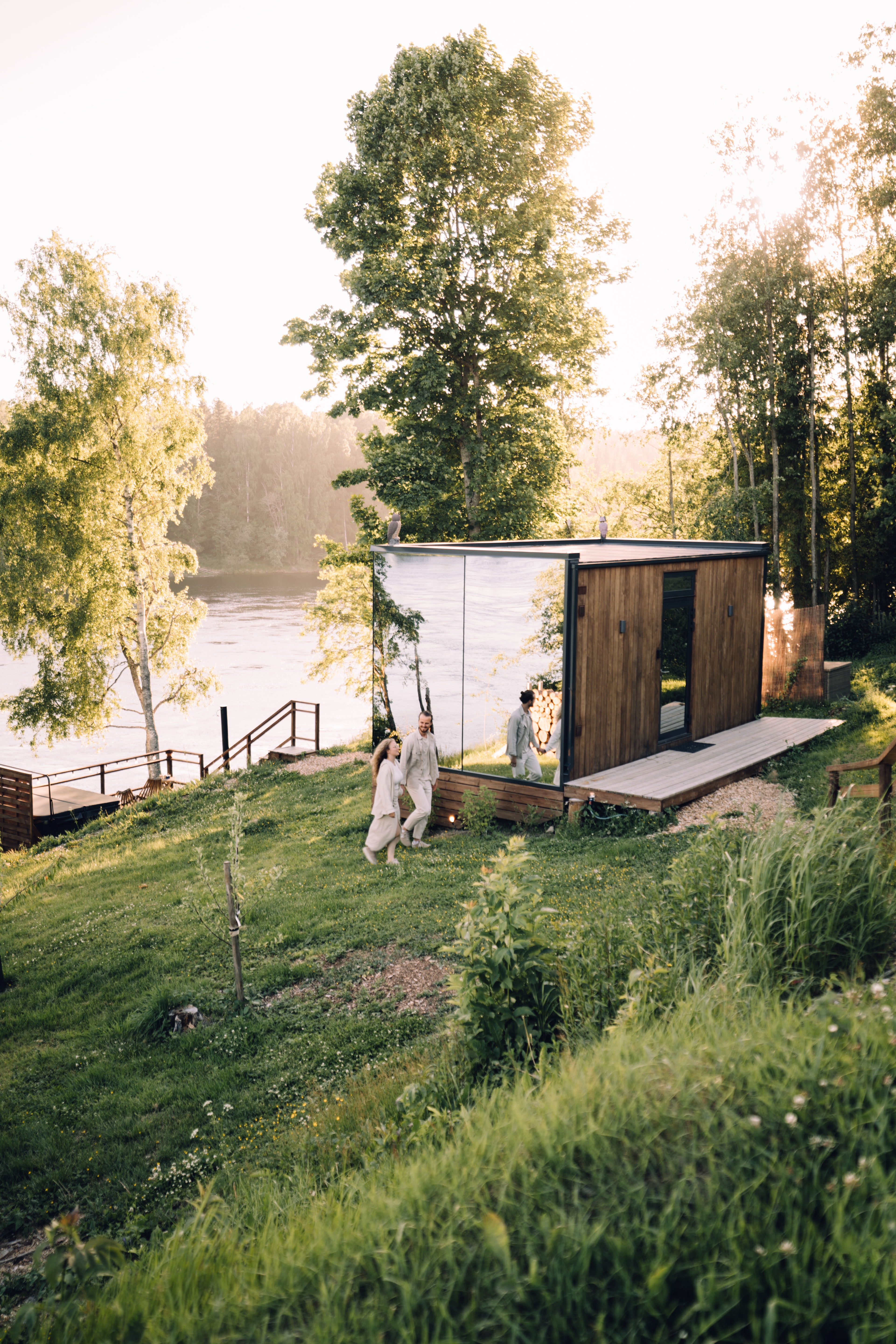 A couple staying at WonderInn Riverside by Huser Farm in Fenstad