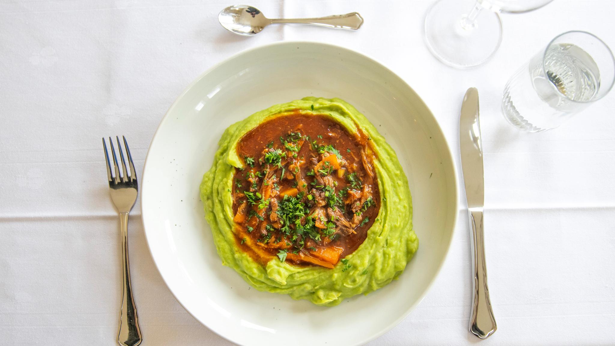 Food on a plate at a table.