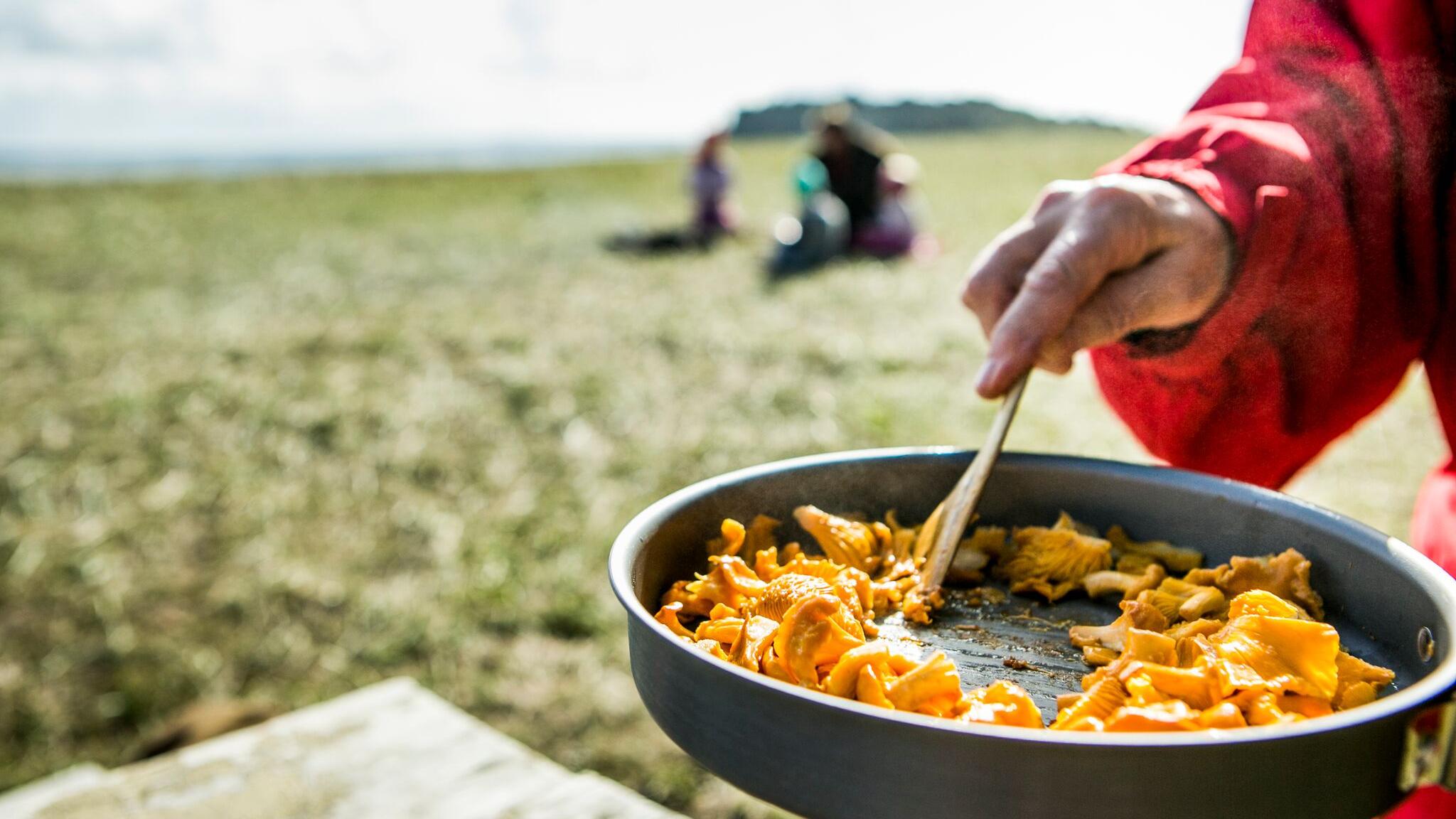 Eva Madsen cooking mushrooms in Moss, Eastern Norway
