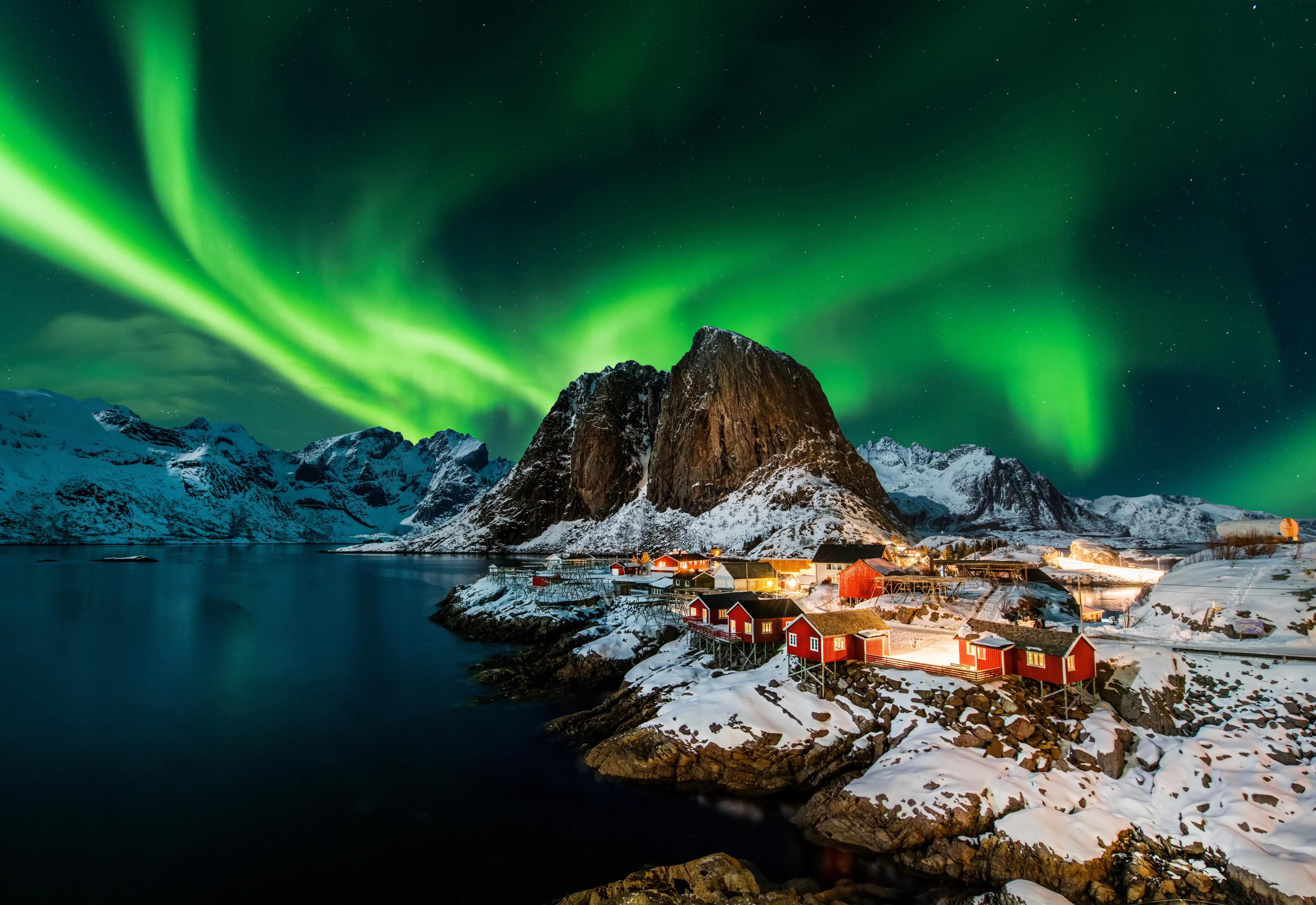 A view of Lofoten underneath the Northern Lights.