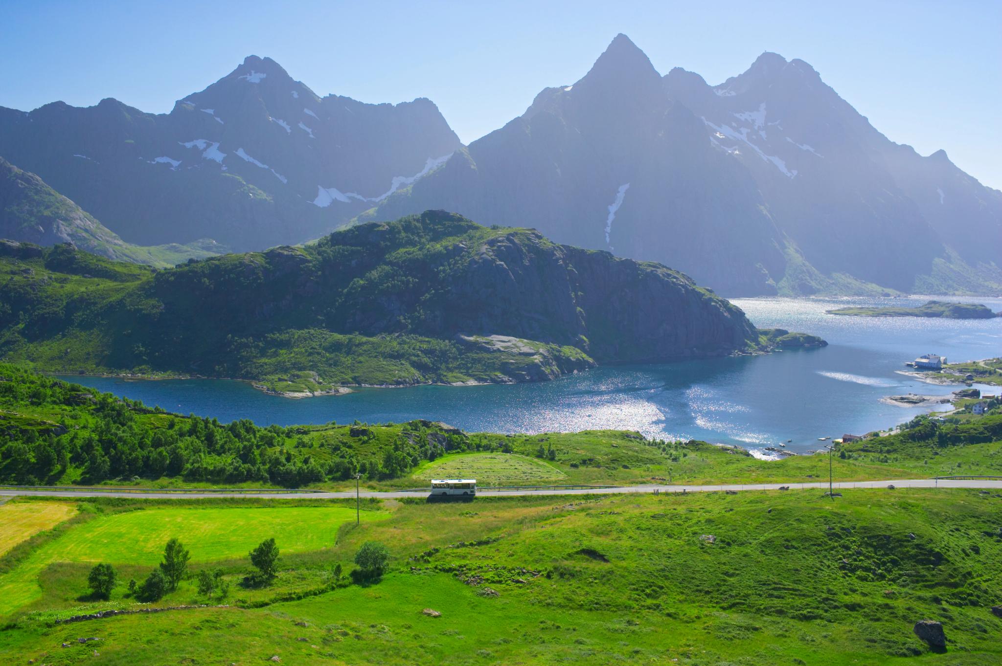 A bus in the summer landscape in Lofoten, Northern Norway.