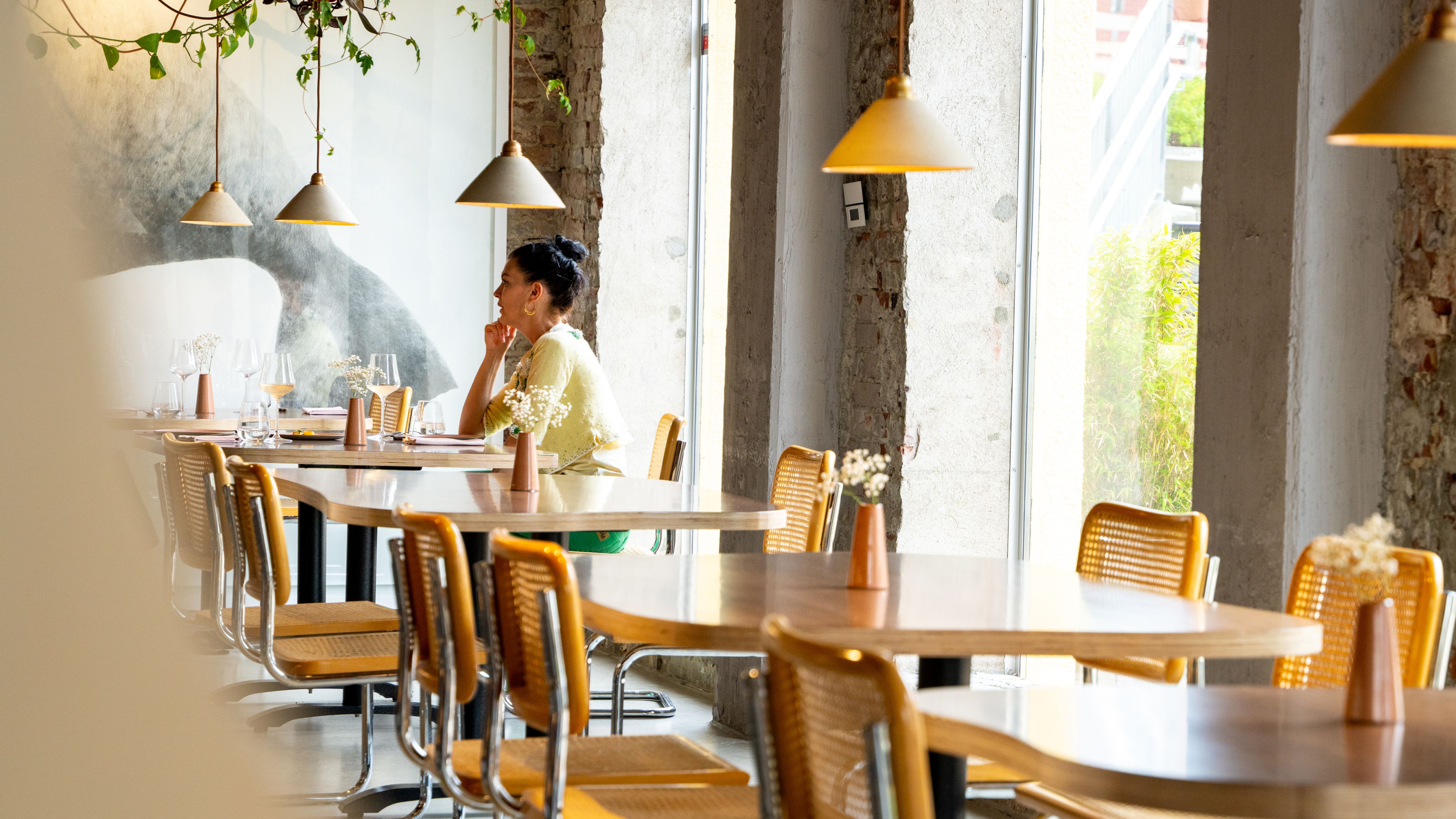 A woman dining at the restaurant Bellies in Stavanger, Fjord Norway