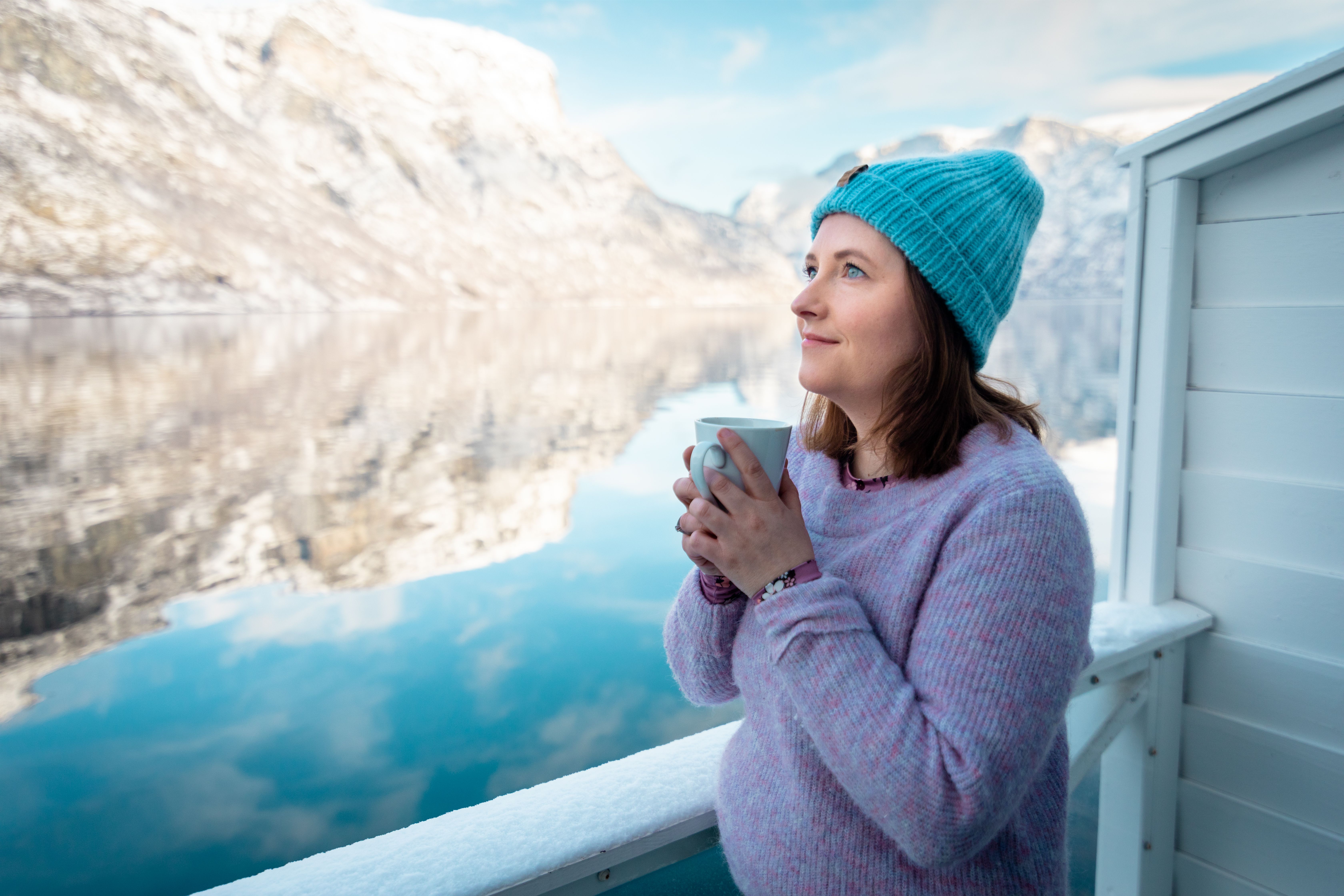 Woman by the fjord in Vangsgaarden Guesthouse in Aurland in Sognefjord
