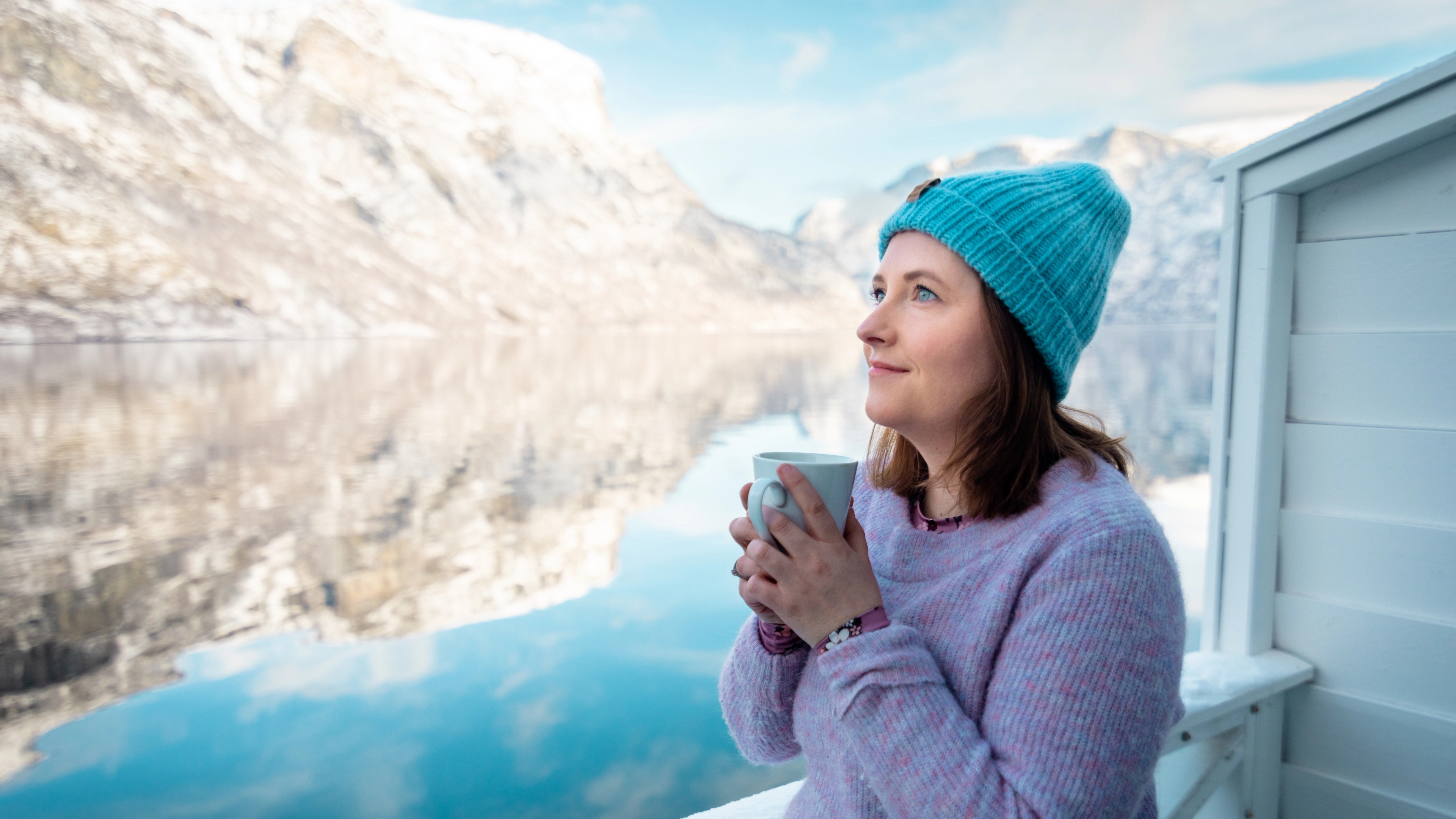 Woman by the fjord in Vangsgaarden Guesthouse in Aurland in Sognefjord