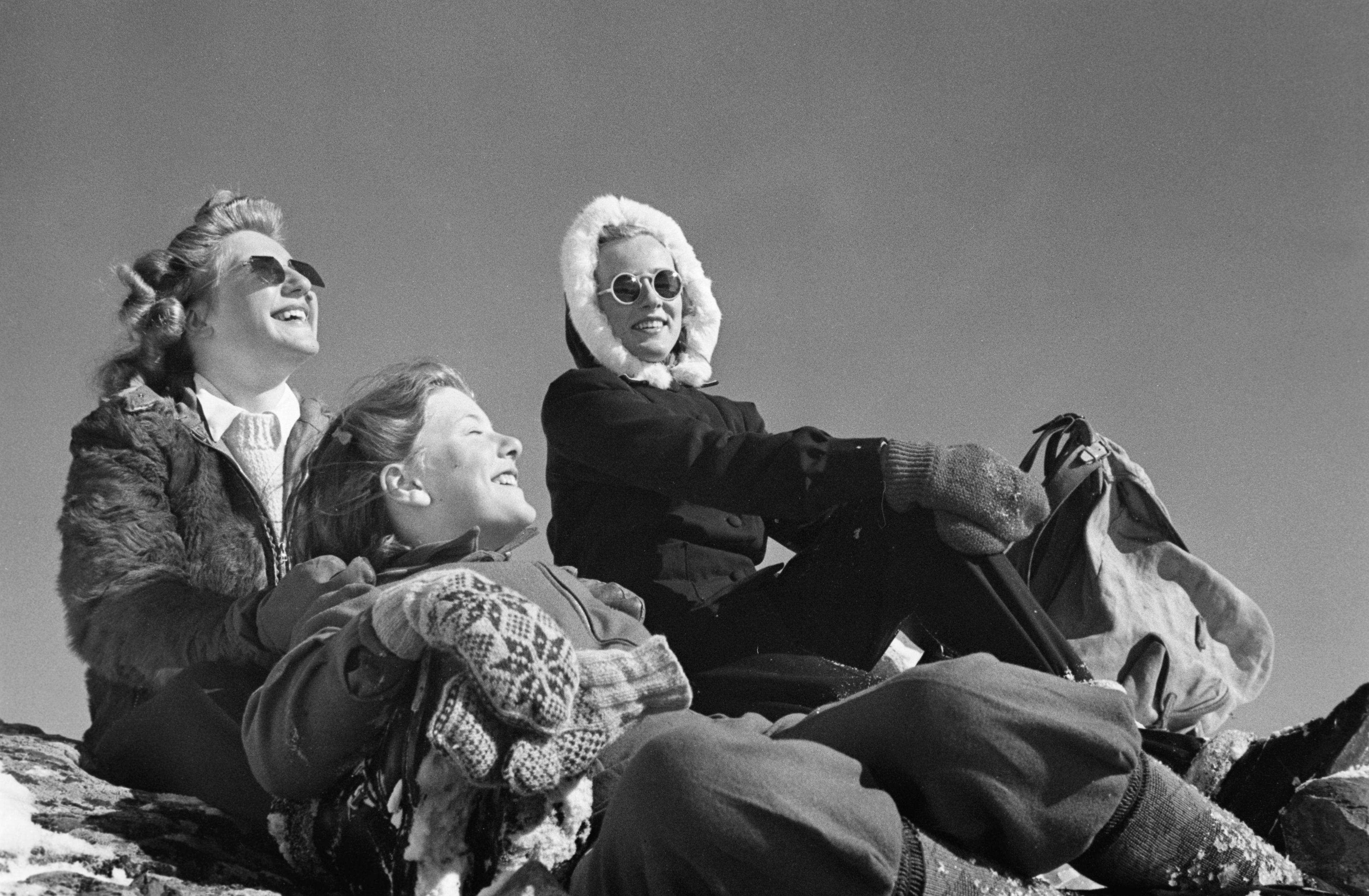 Tre people wearing Selbu mittens in winter time, Norway.