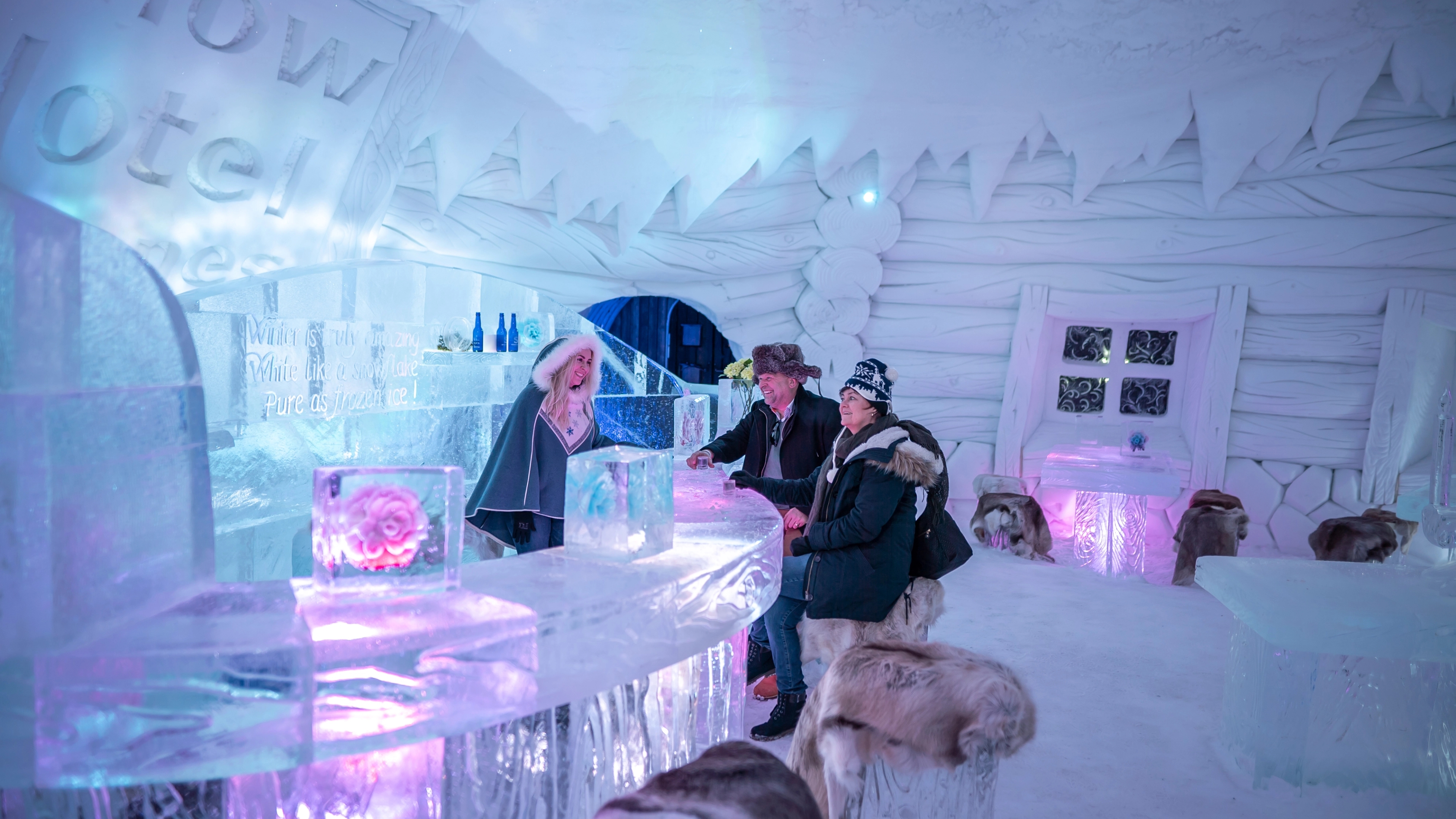 Guests in the ice bar at Snowhotel Kirkenes