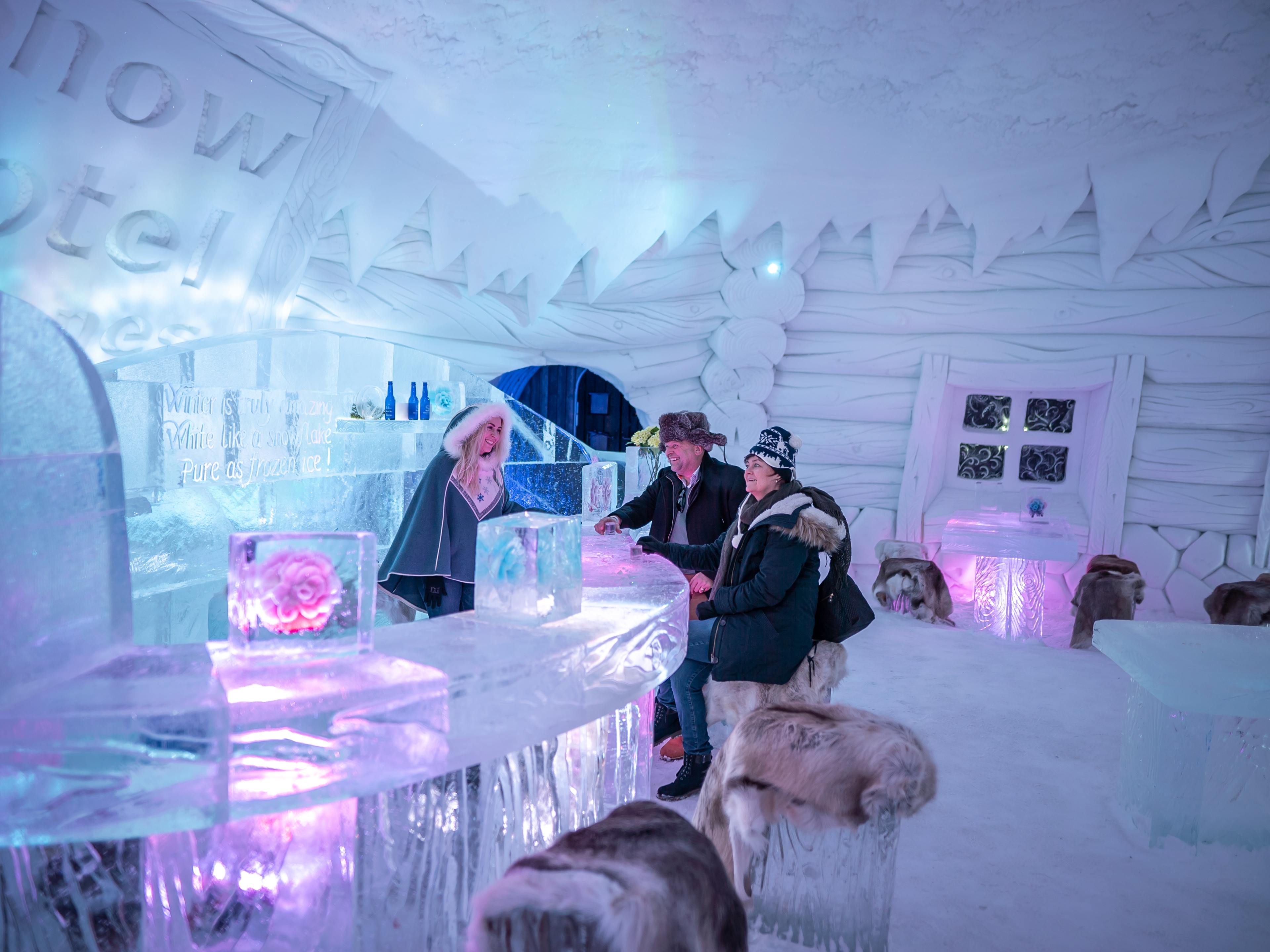 Guests in the ice bar at Snowhotel Kirkenes