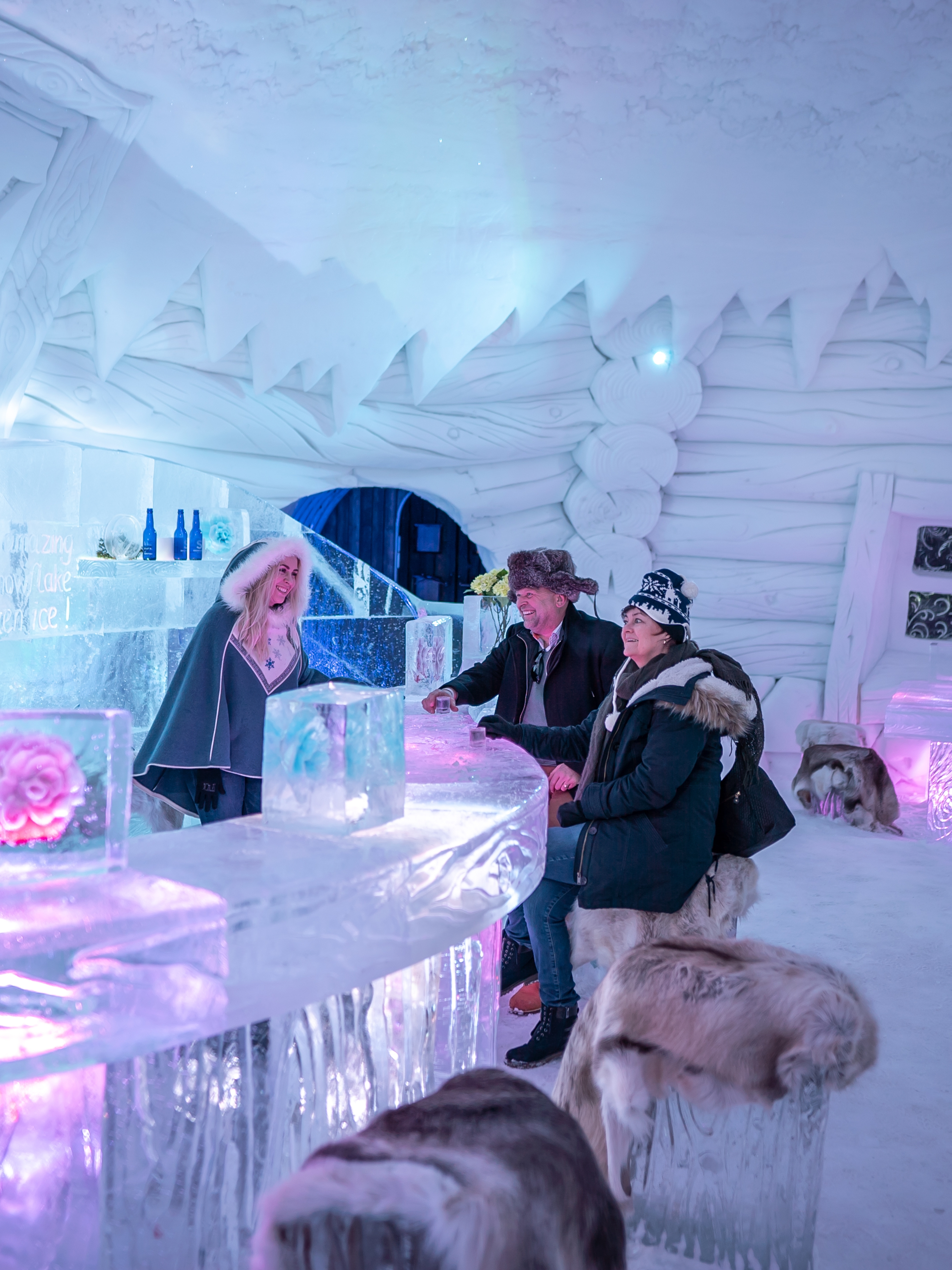 Guests in the ice bar at Snowhotel Kirkenes