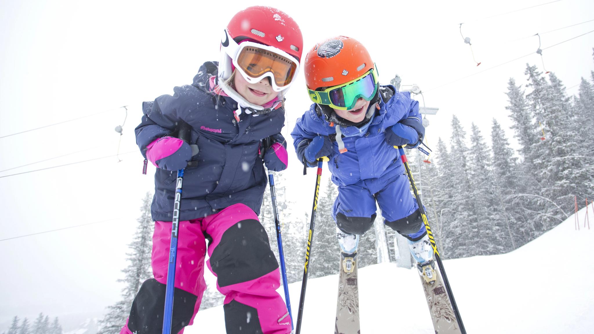Two children alpine skiing in Hemsedal, Eastern Norway