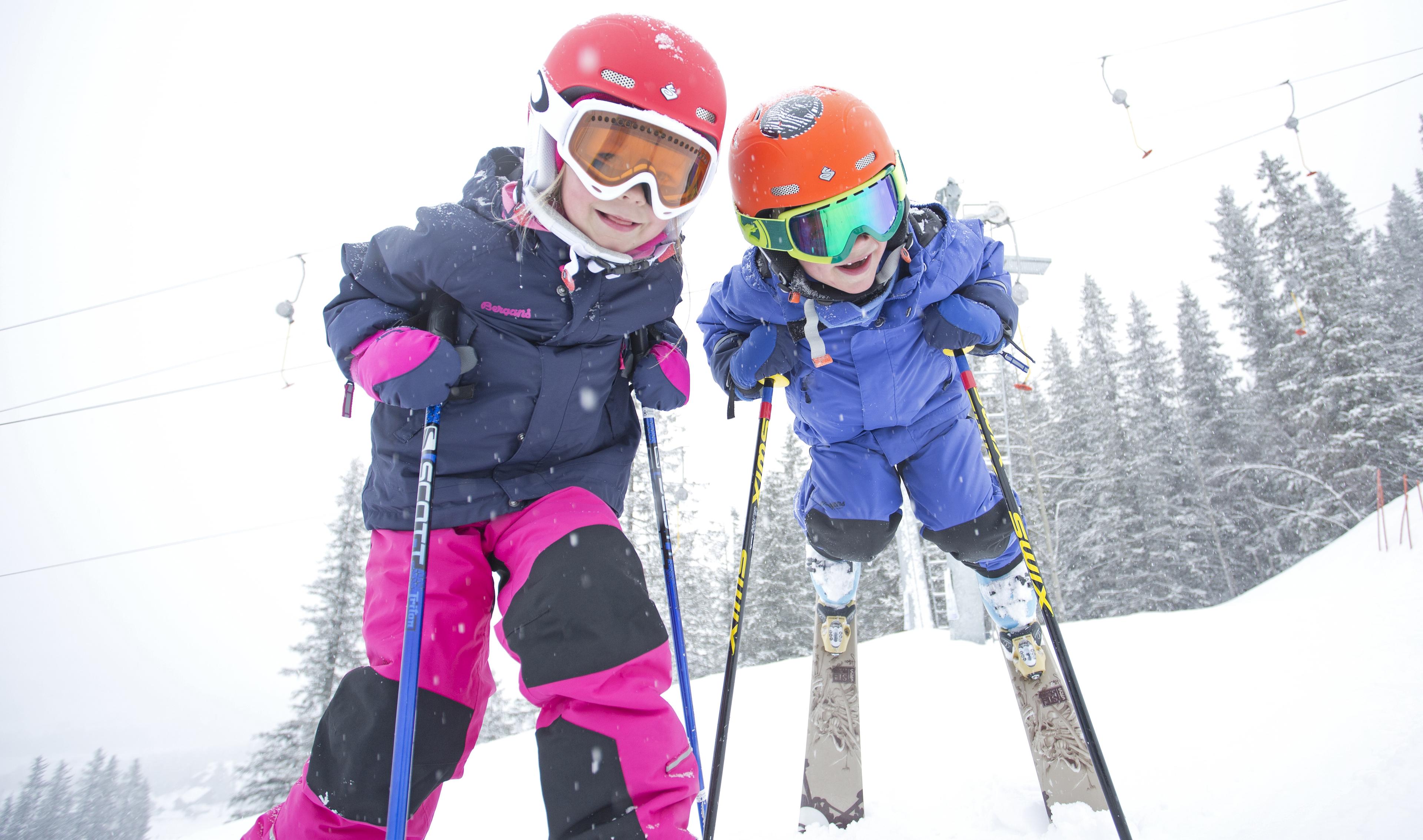 Two children alpine skiing in Hemsedal, Eastern Norway