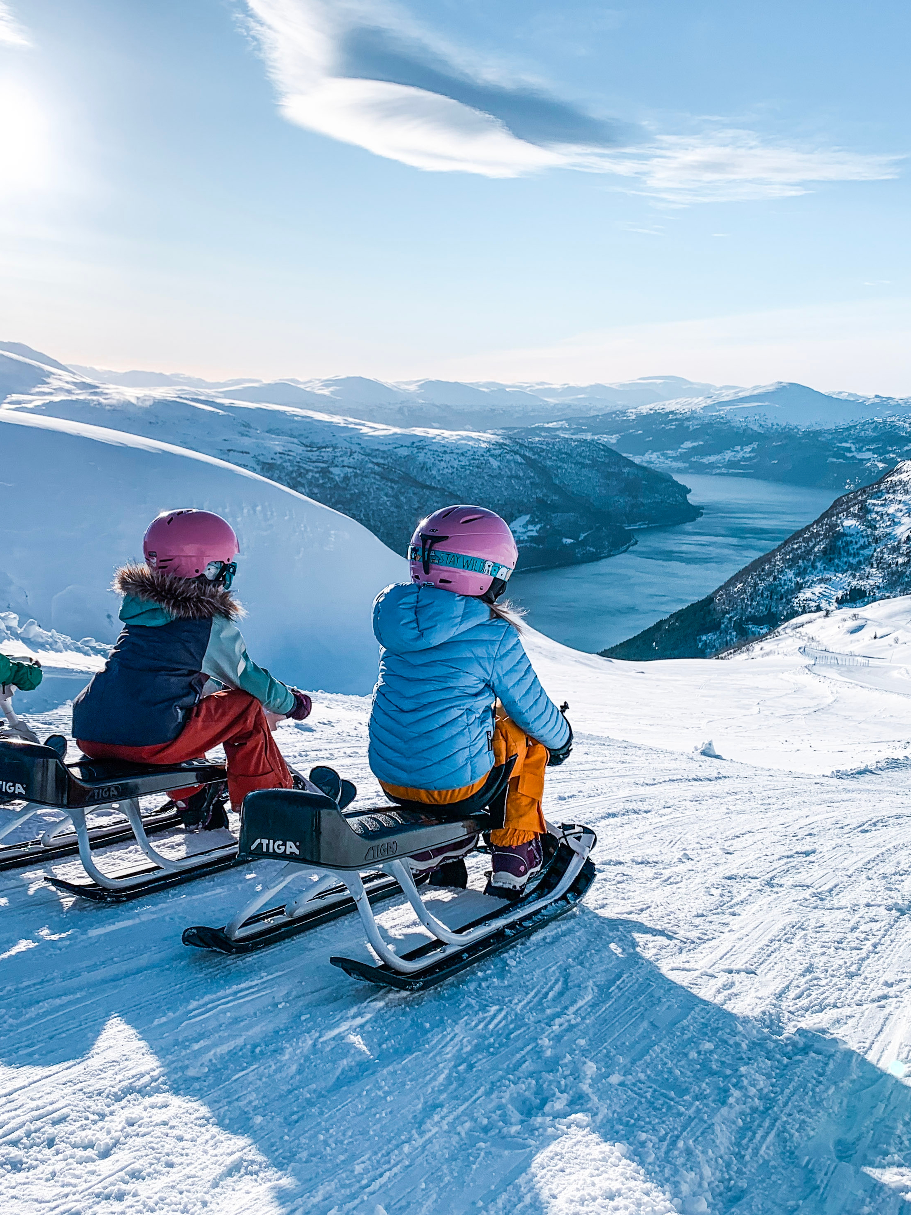 Girls on sleds at Loen Skylift, Norway.