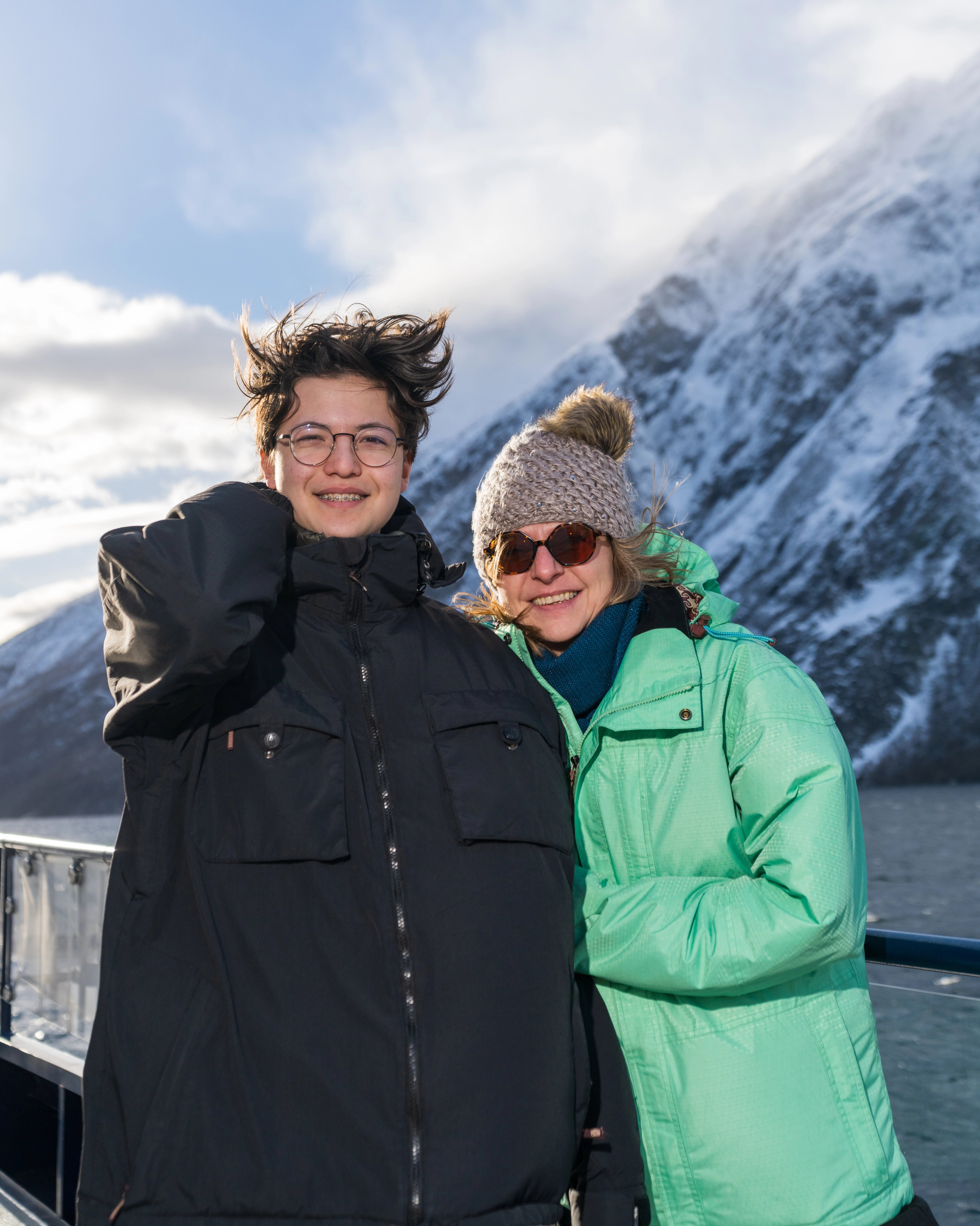 Mother and son on winter cruise with Fjordrangers to Geiranger