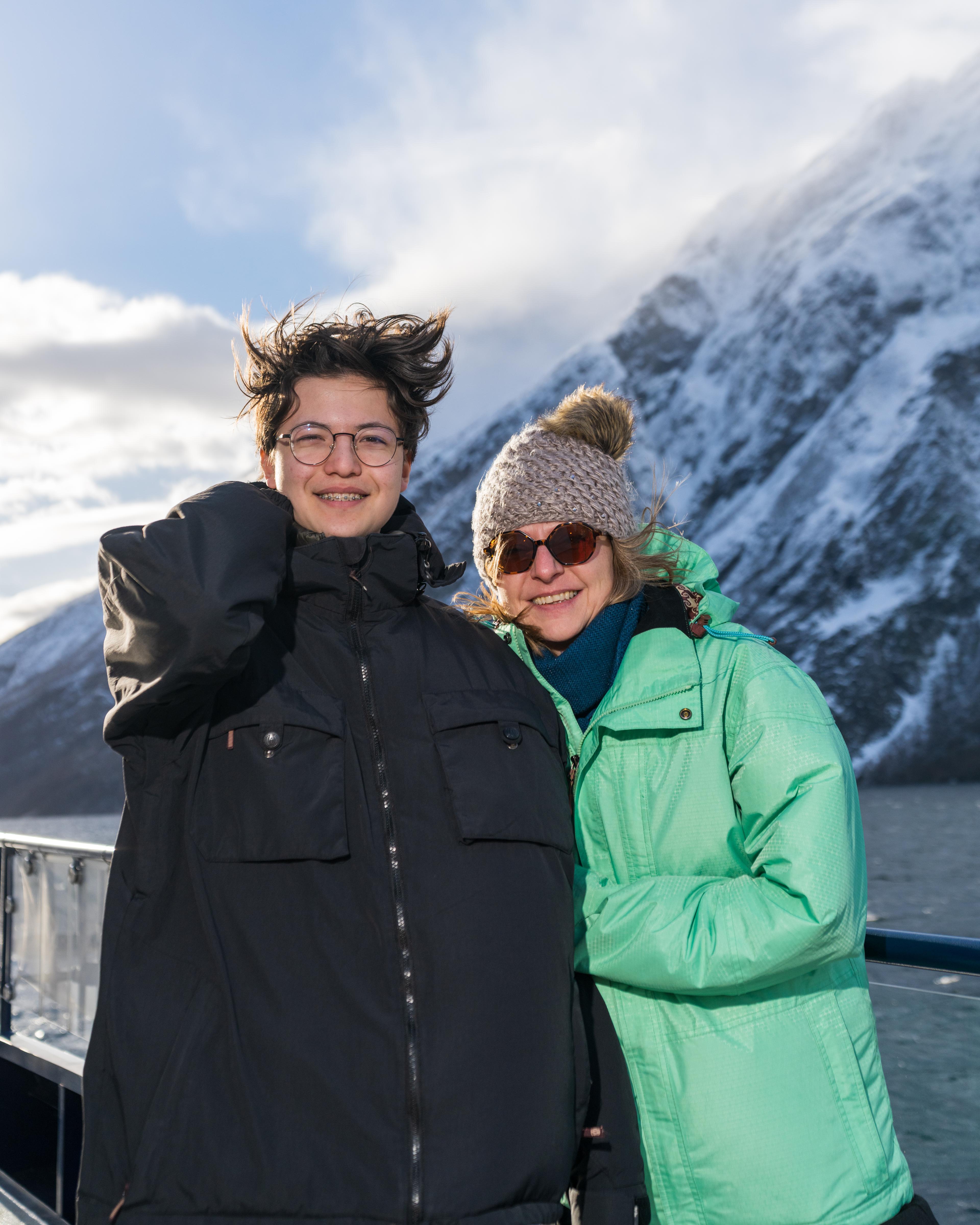 Mother and son on winter cruise with Fjordrangers to Geiranger