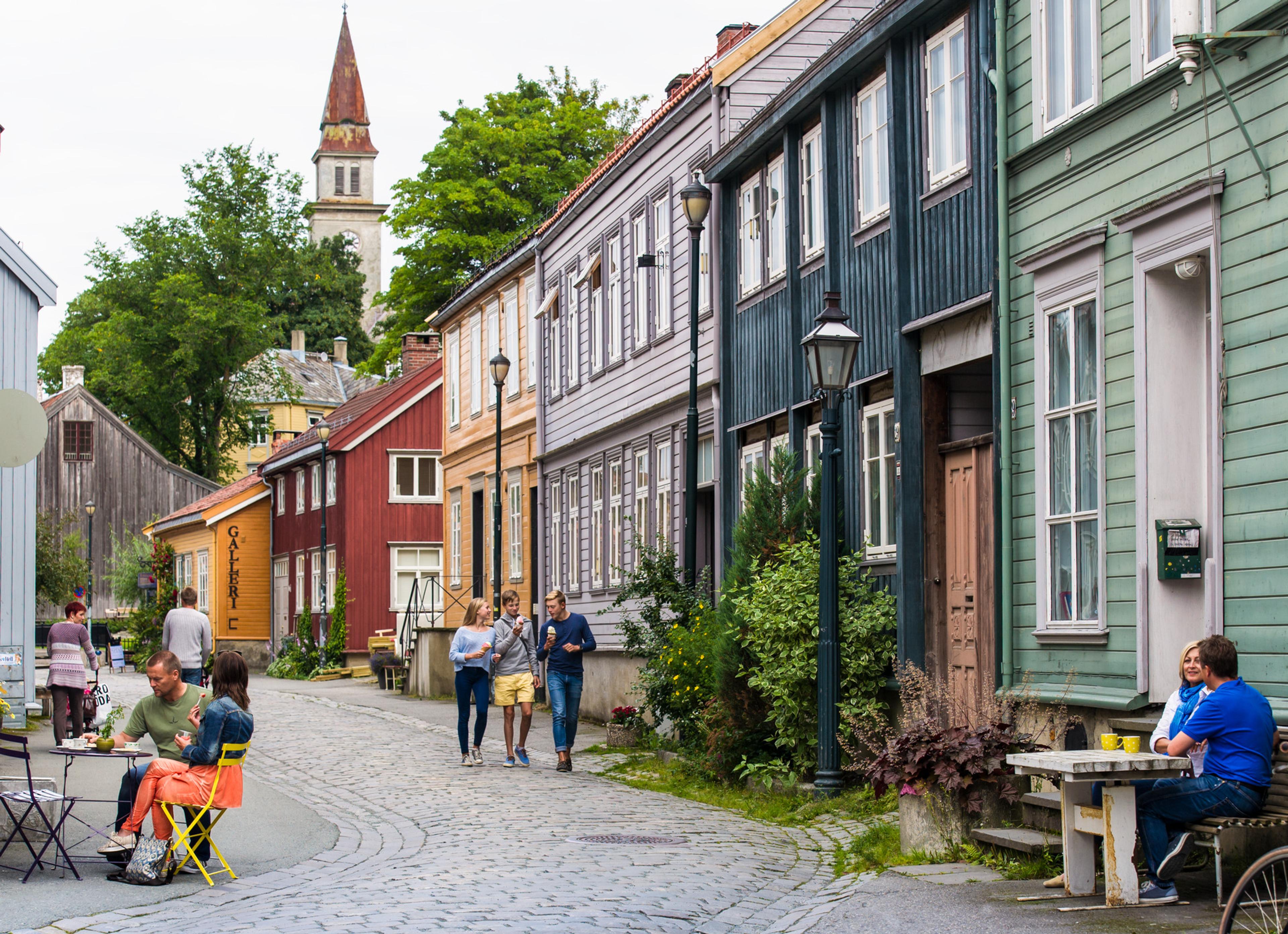 People walking along cobbled streets